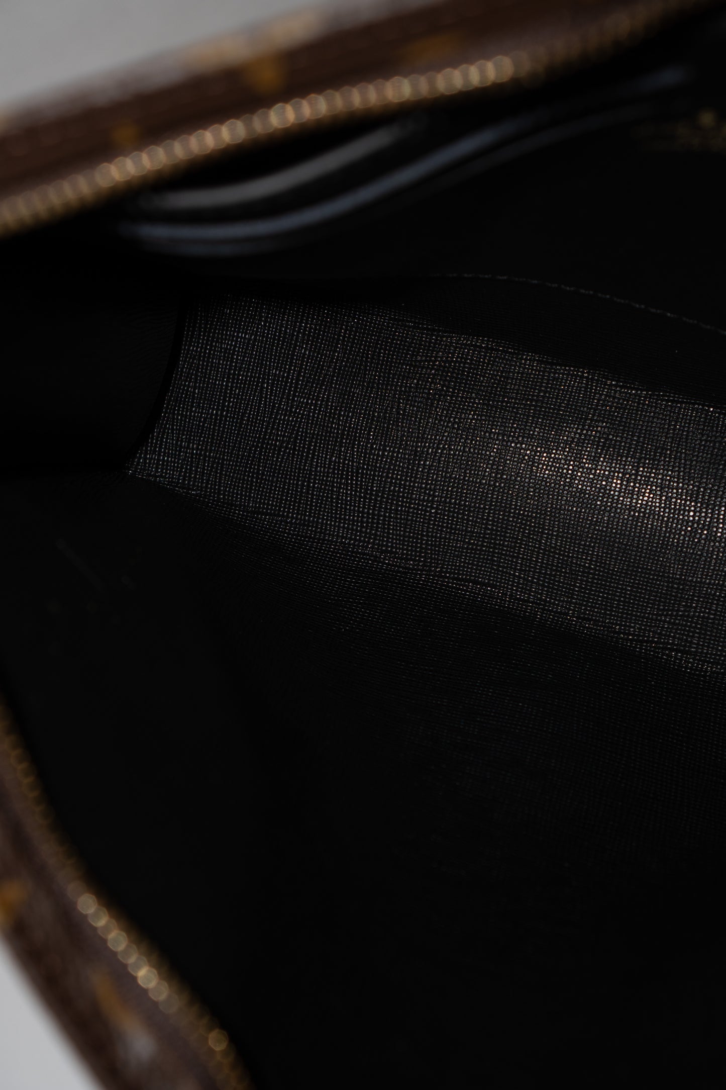 Structured Travel Pouch – Monogram Canvas with Black Leather Trim