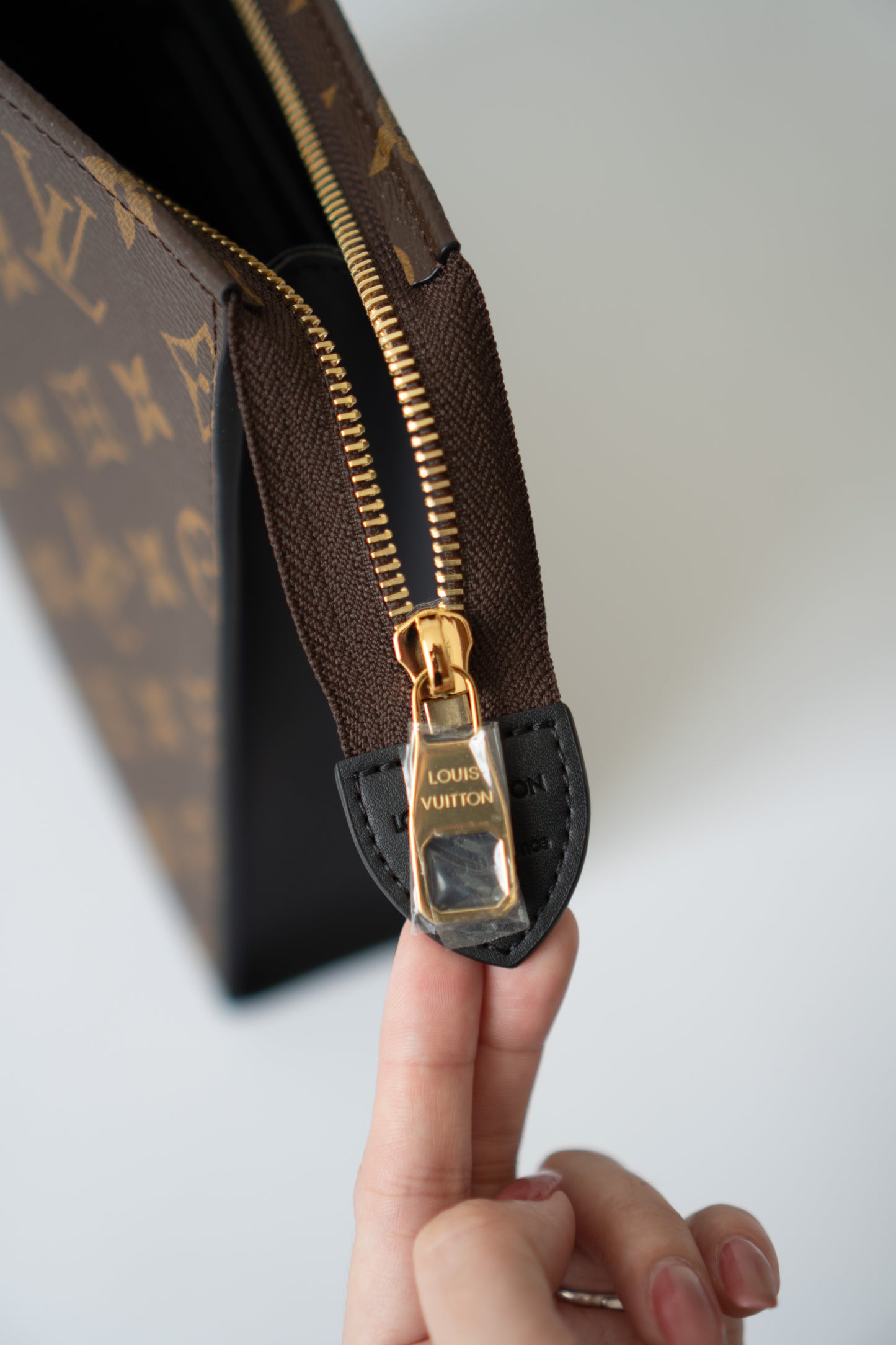 Structured Travel Pouch – Monogram Canvas with Black Leather Trim