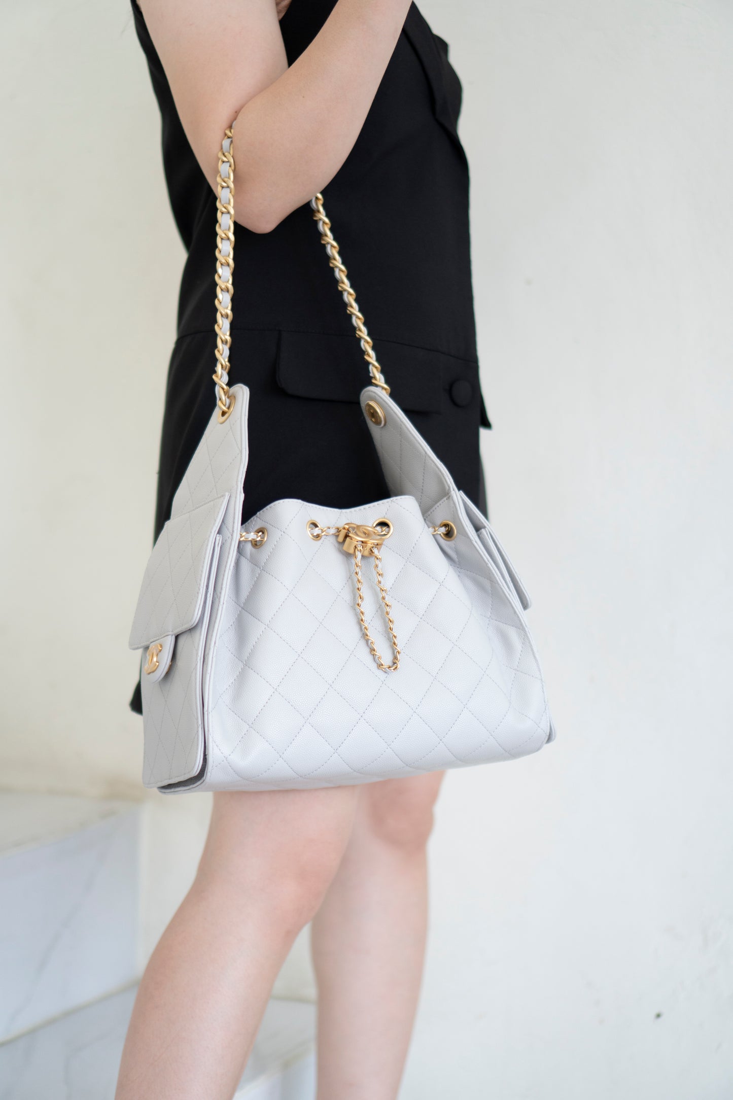 C25 Small Drawstring Chain Bag – Light Gray Caviar Leather with Gold Hardware