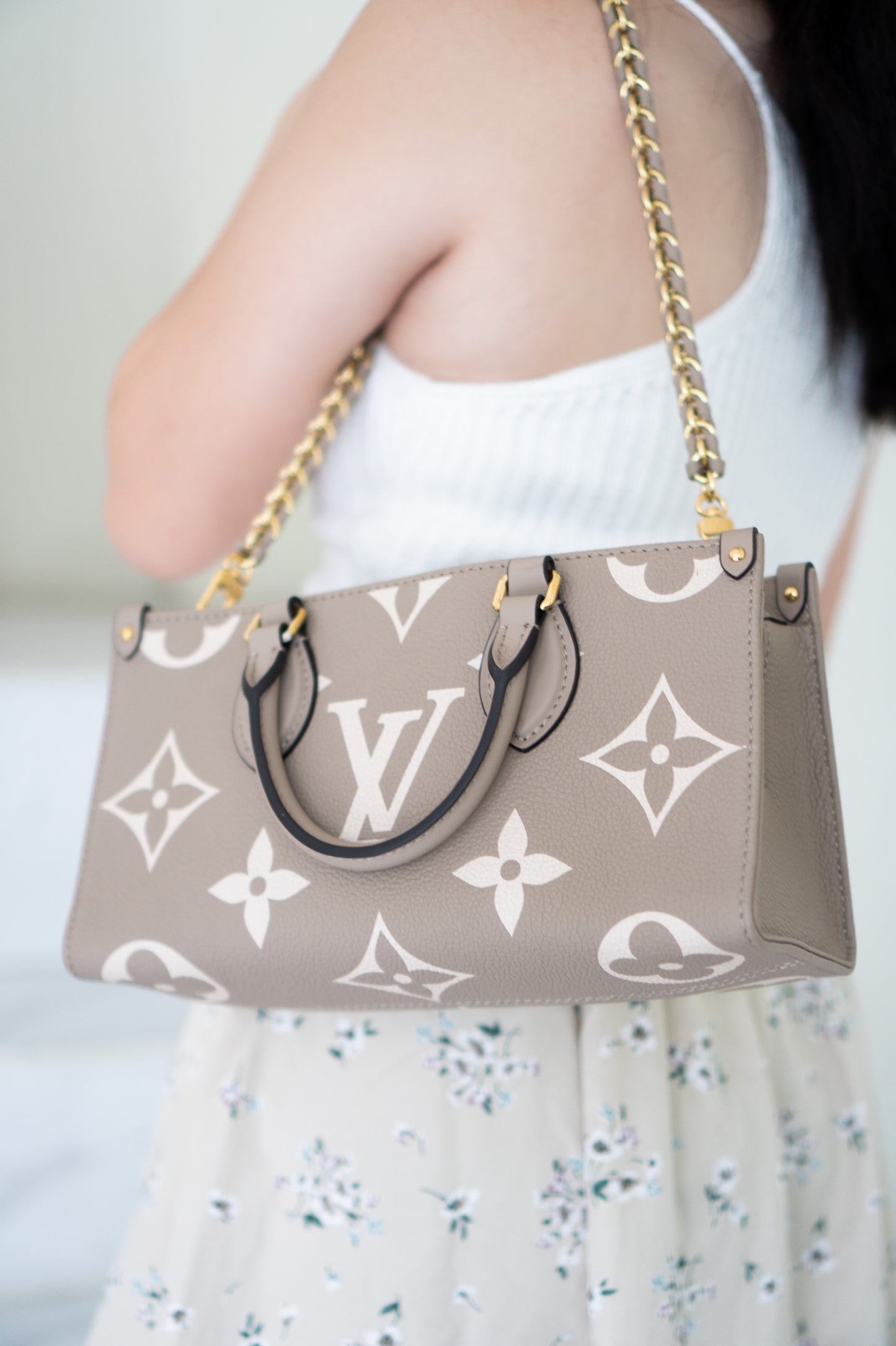 OnTheGo East-West Tote – Tourterelle Monogram Embossed Leather with Gold Hardware