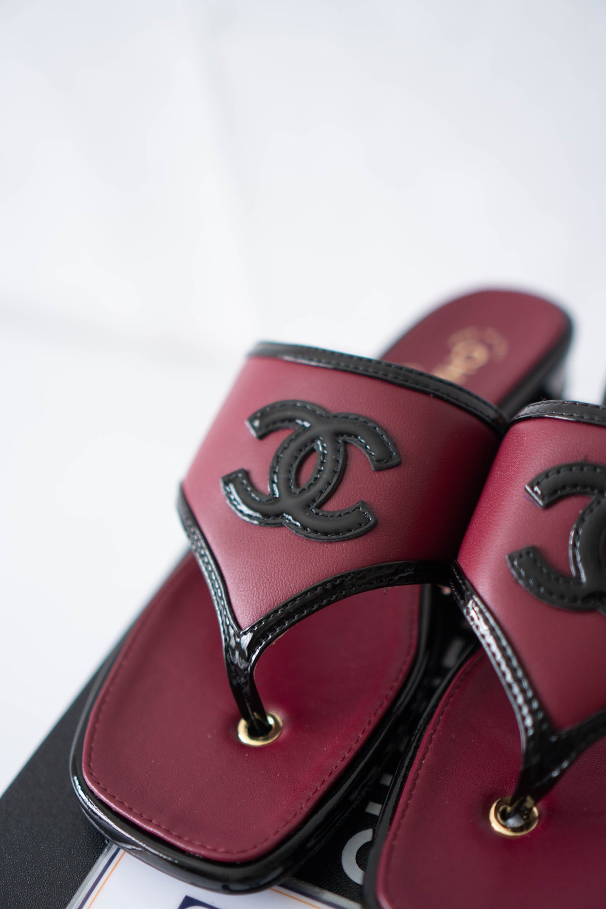 CC Thong Sandals – Burgundy Calfskin & Black Patent Leather