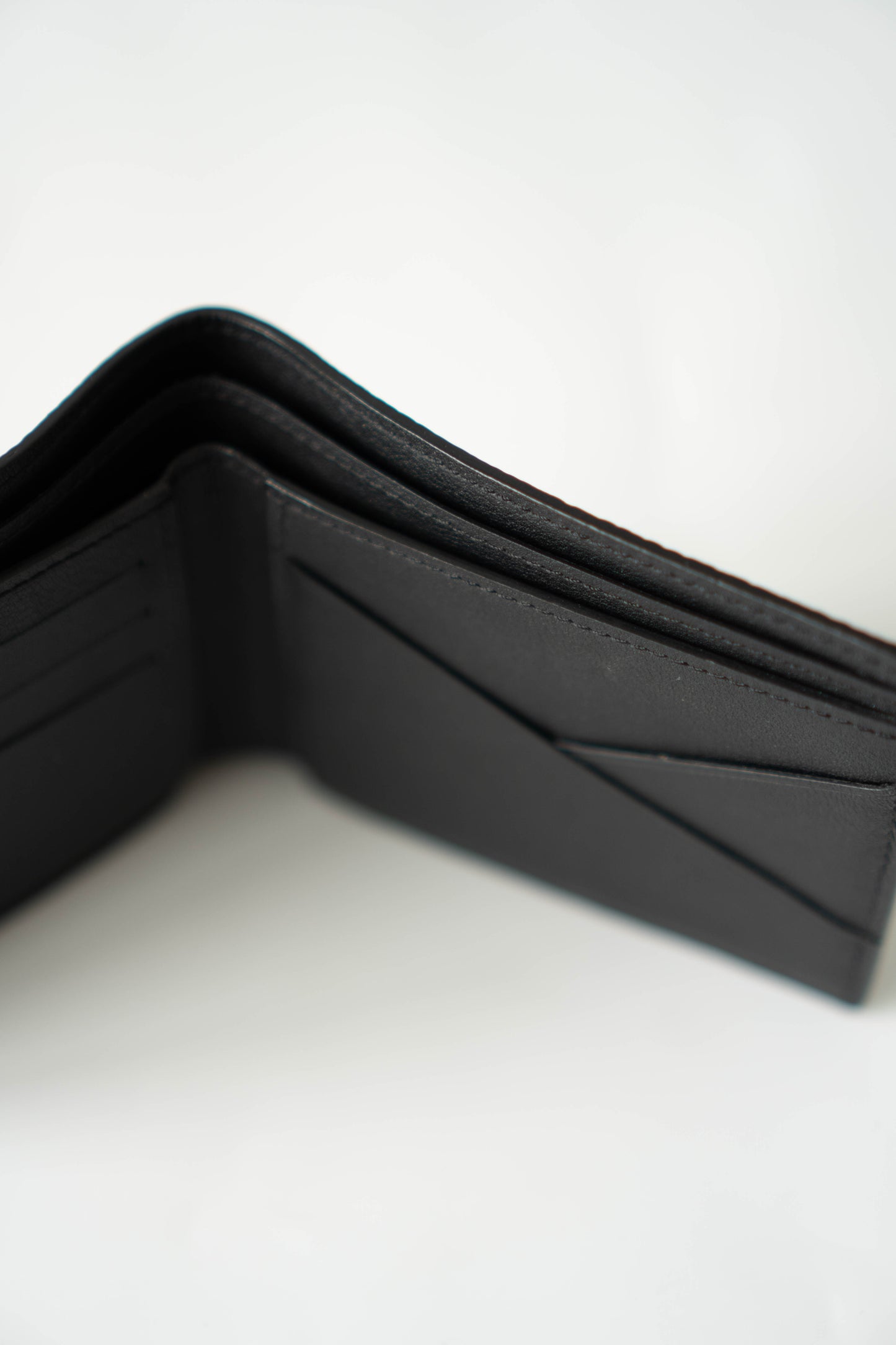 Multiple Wallet in Noir Calfskin leather with Black LV Aerogram (Pre-loved)