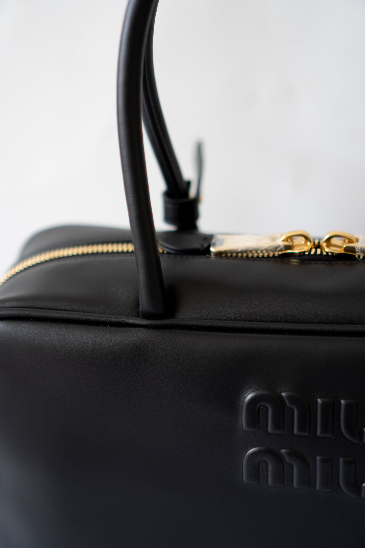Beau Medium Bowling Bag – Black Smooth Calfskin with Gold Hardware