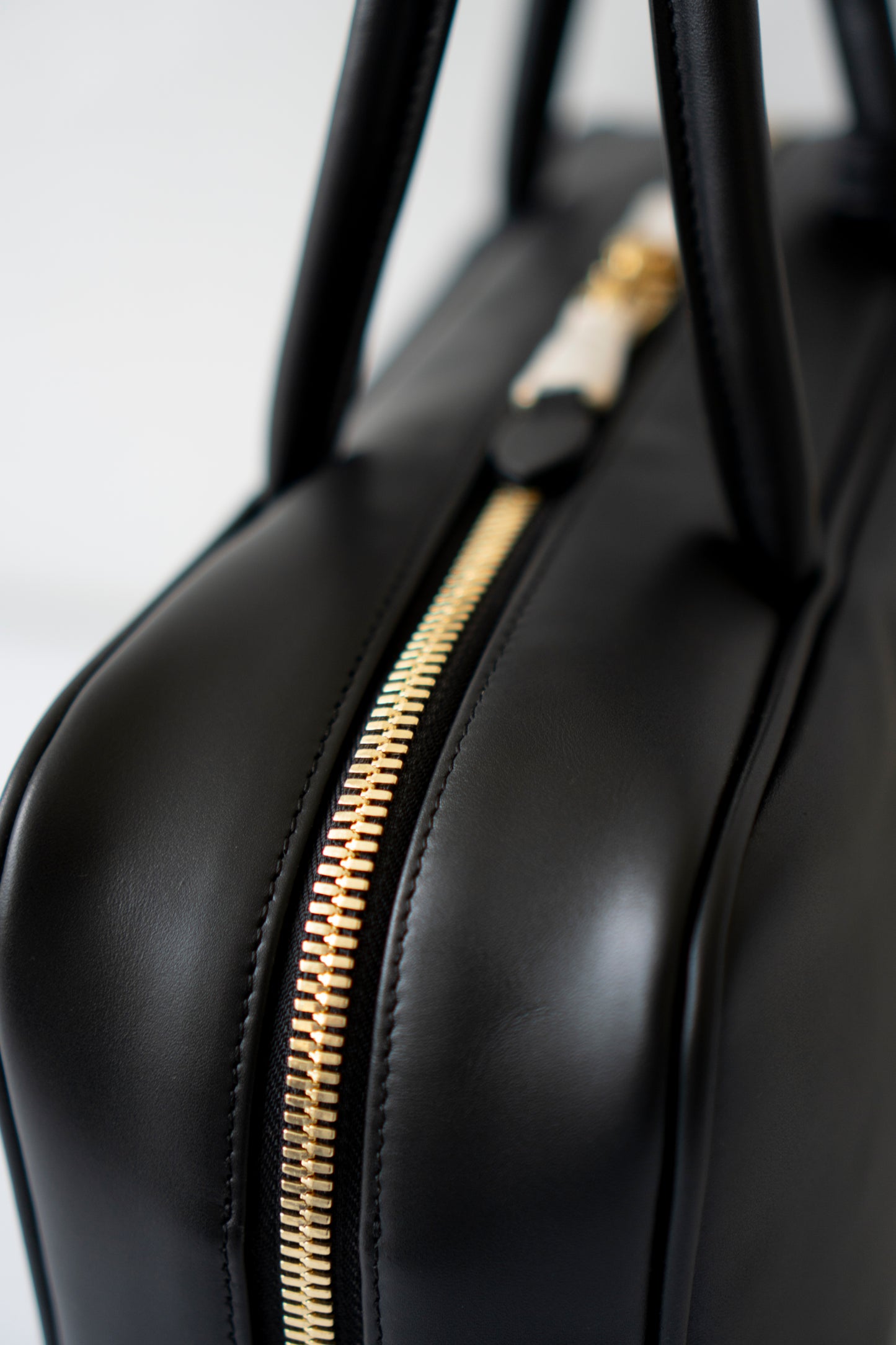 Beau Medium Bowling Bag – Black Smooth Calfskin with Gold Hardware