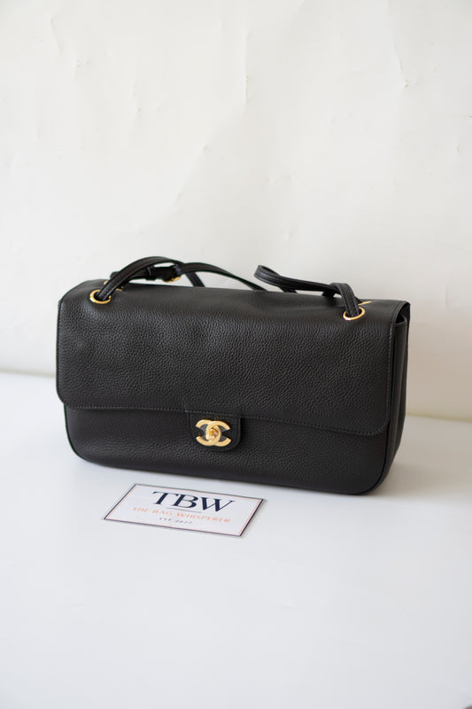 26S Souplissimo Jumbo Flap – Black Grained Calfskin with Gold Hardware