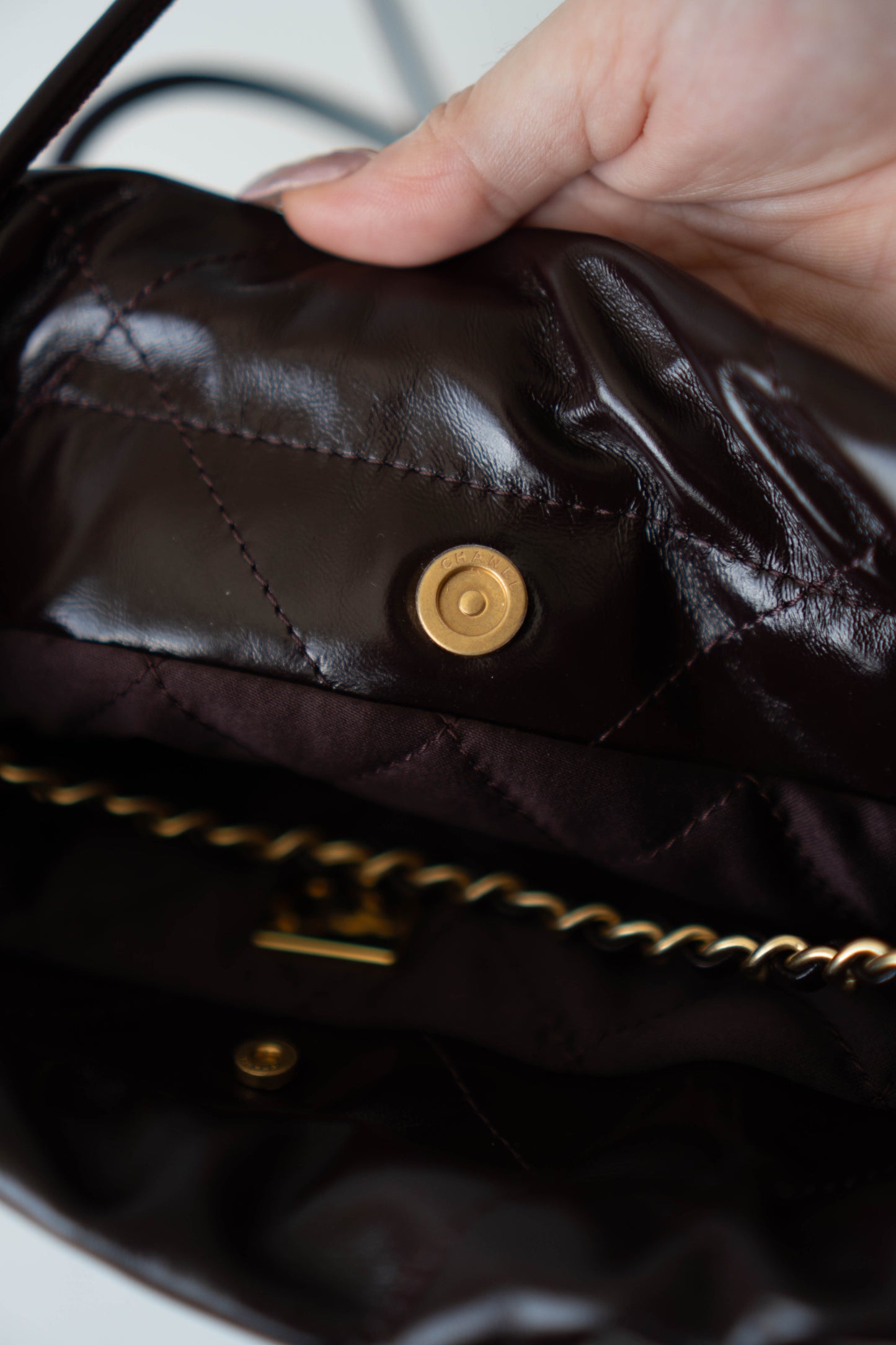 C22 Dark Brown in Mini Shiny Calfskin with Gold Hardware