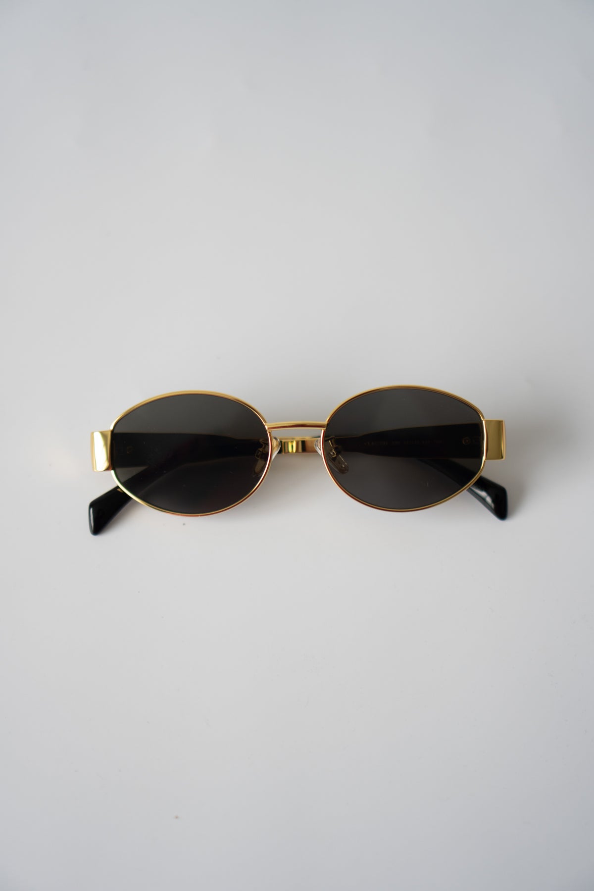 Metal Oval Sunglasses – Gold with Dark Lenses