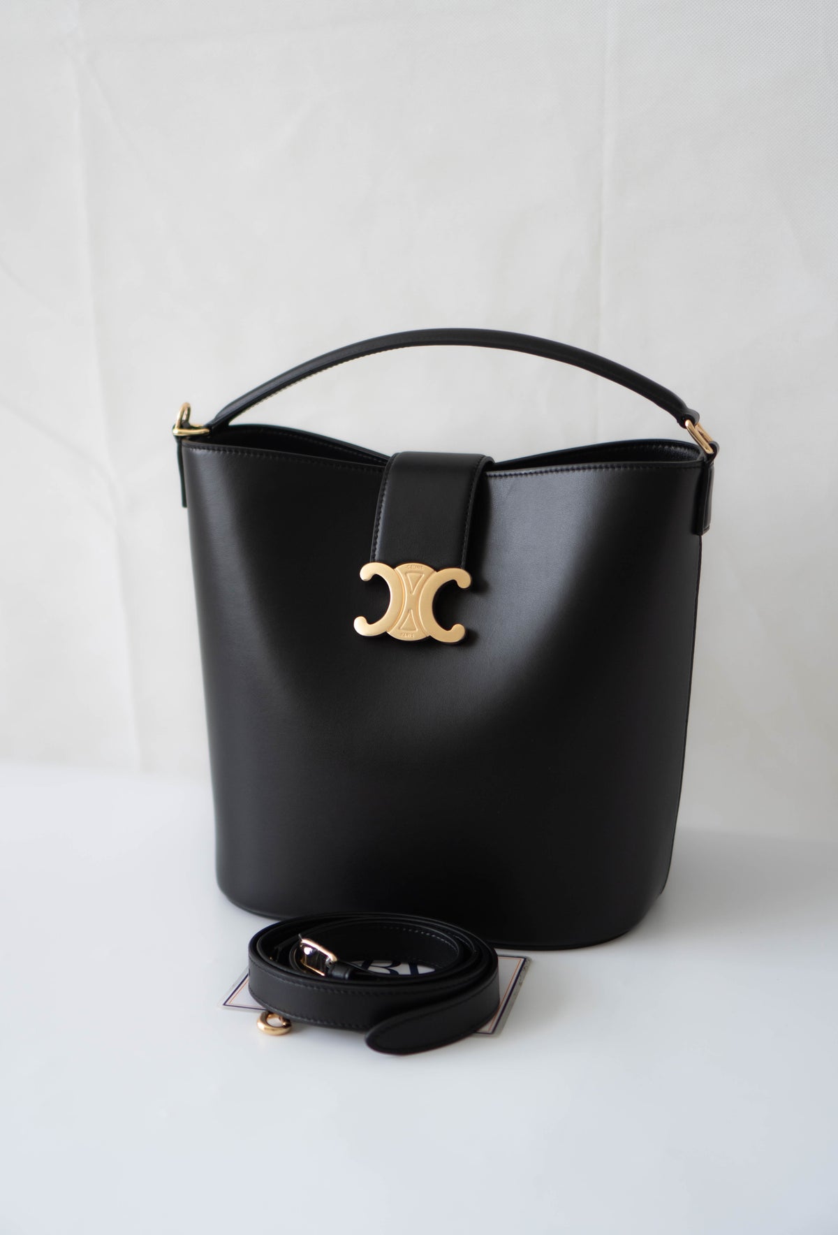 Triomphe Medium Bucket Bag – Black Smooth Calfskin in Gold Hardware