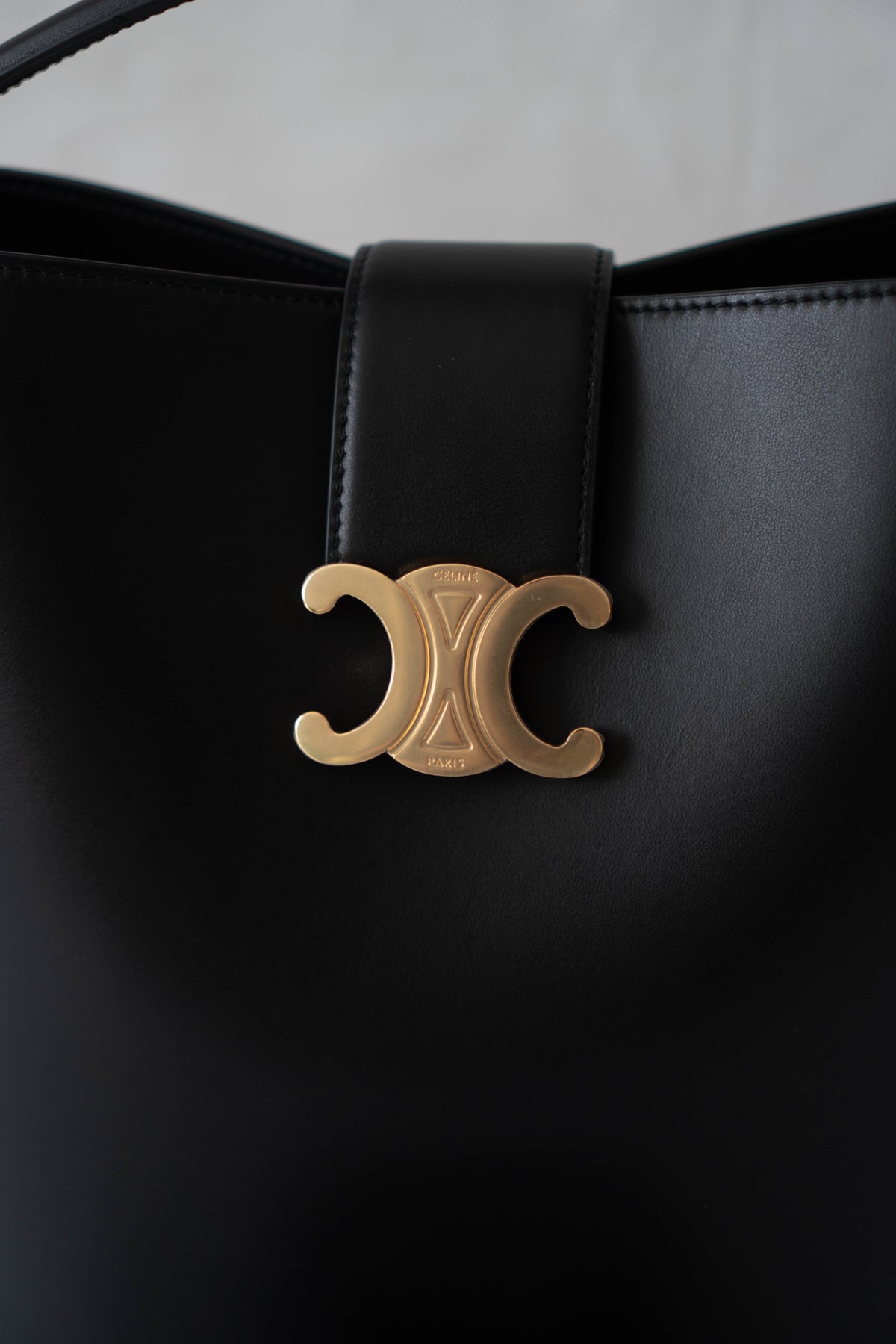 Triomphe Medium Bucket Bag – Black Smooth Calfskin in Gold Hardware
