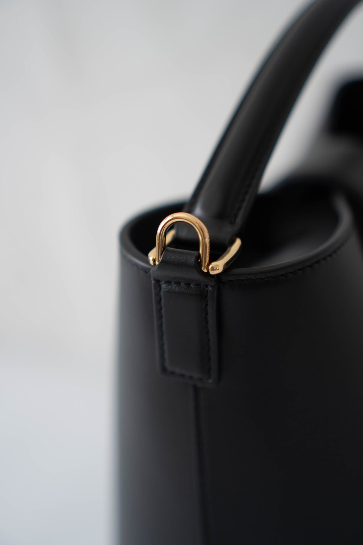 Triomphe Medium Bucket Bag – Black Smooth Calfskin in Gold Hardware