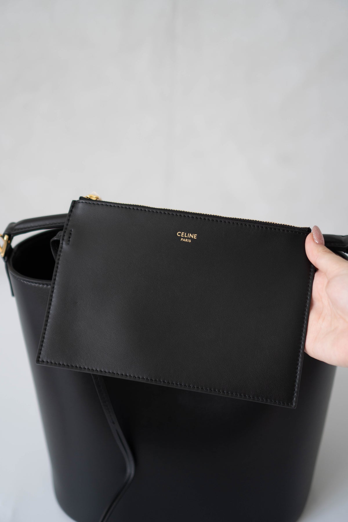 Triomphe Medium Bucket Bag – Black Smooth Calfskin in Gold Hardware