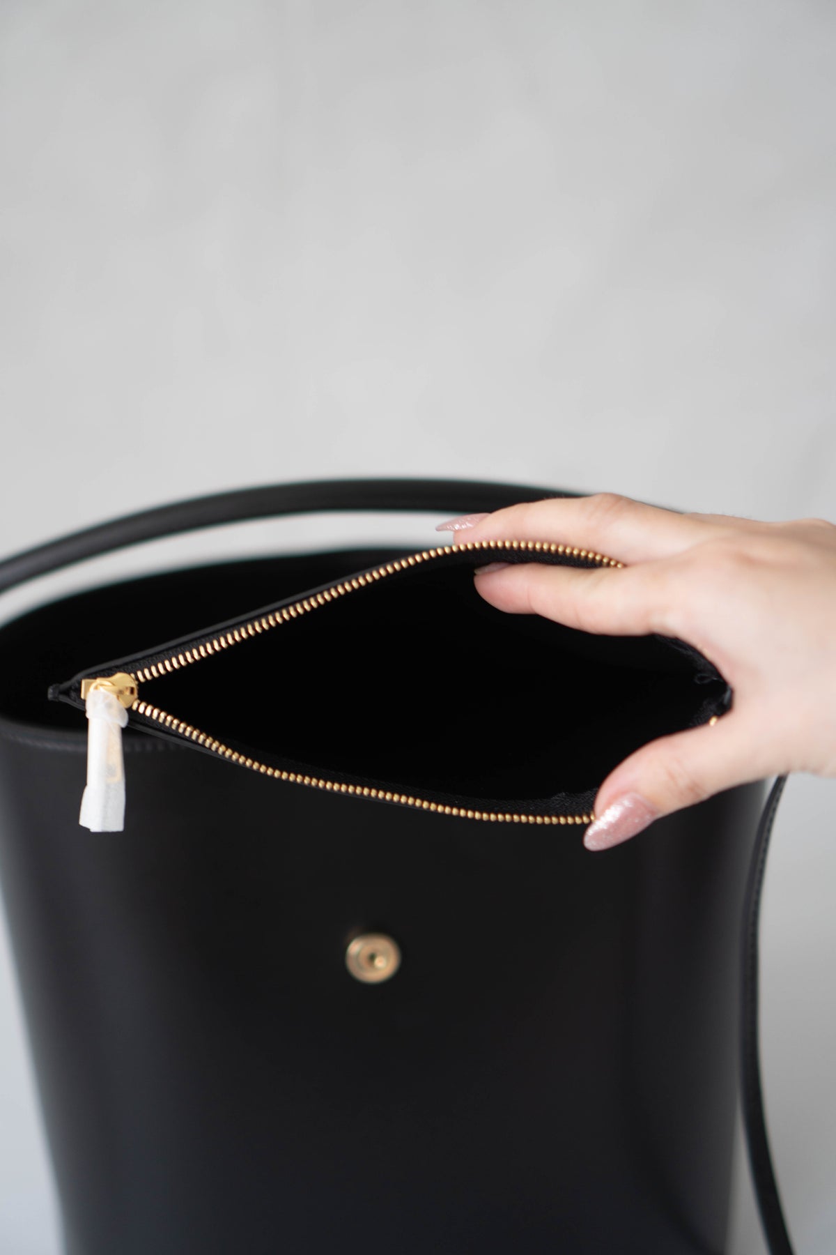 Triomphe Medium Bucket Bag – Black Smooth Calfskin in Gold Hardware