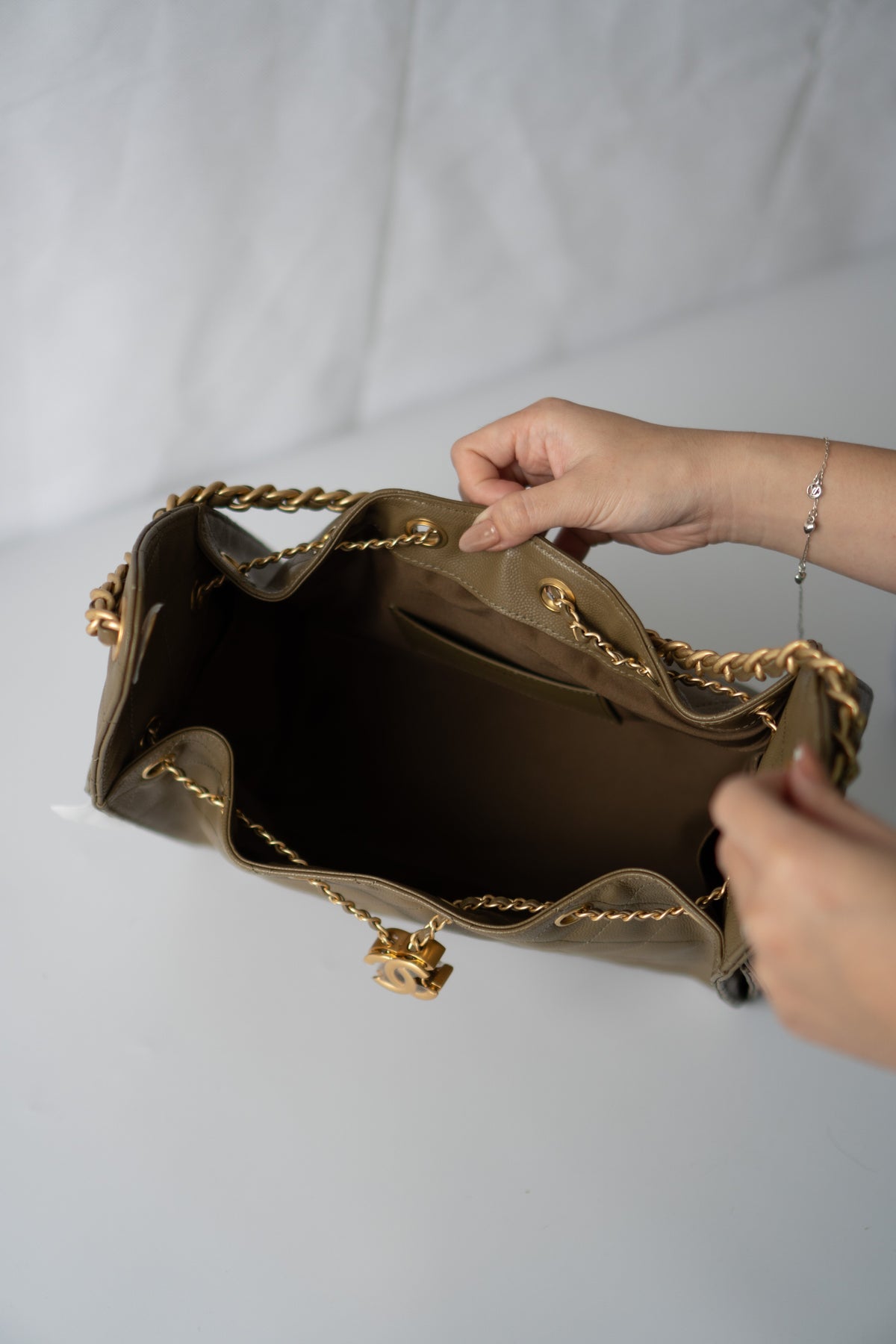 C25 Drawstring Bucket Bag – Small Khaki Green Caviar with Gold Hardware