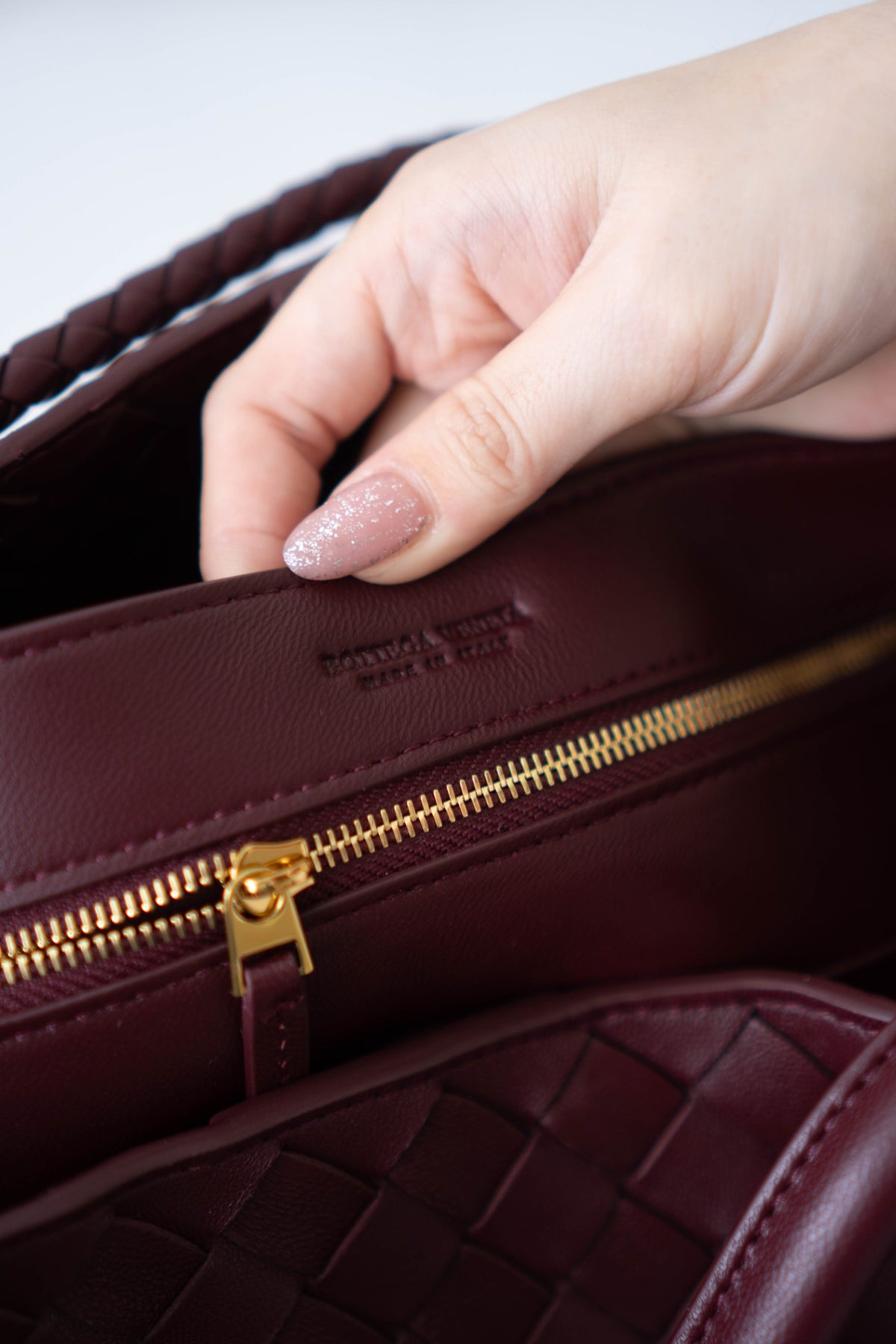 Andiamo Medium Bag – Burgundy Intrecciato Nappa Leather in Gold Hardware