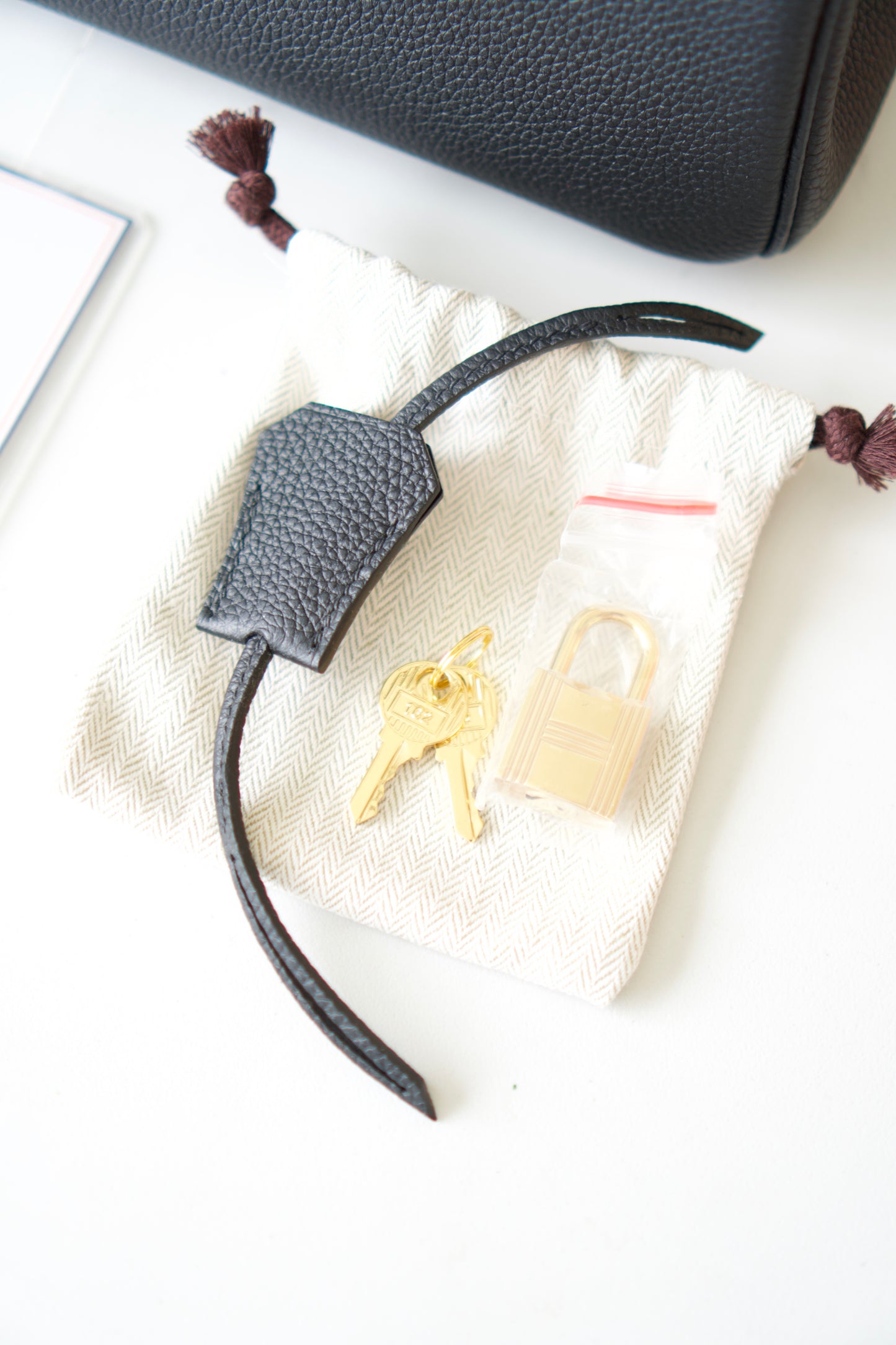 BK 25 – Noir Togo Leather with Gold Hardware