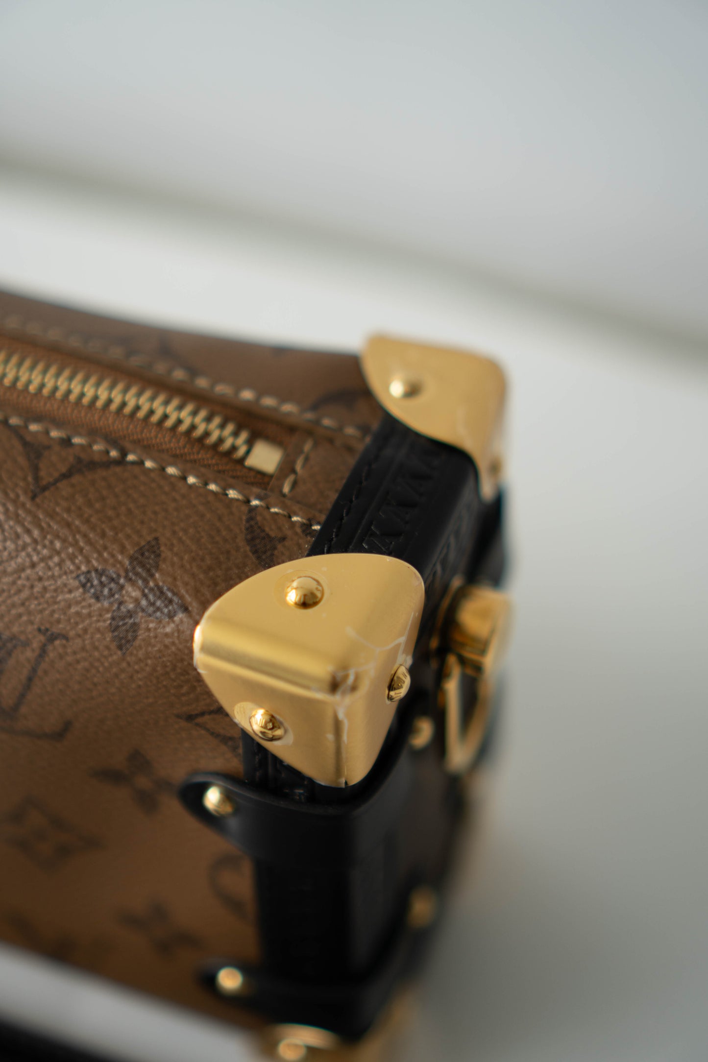 Side Trunk in PM Reverse Monogram with Gold Hardware
