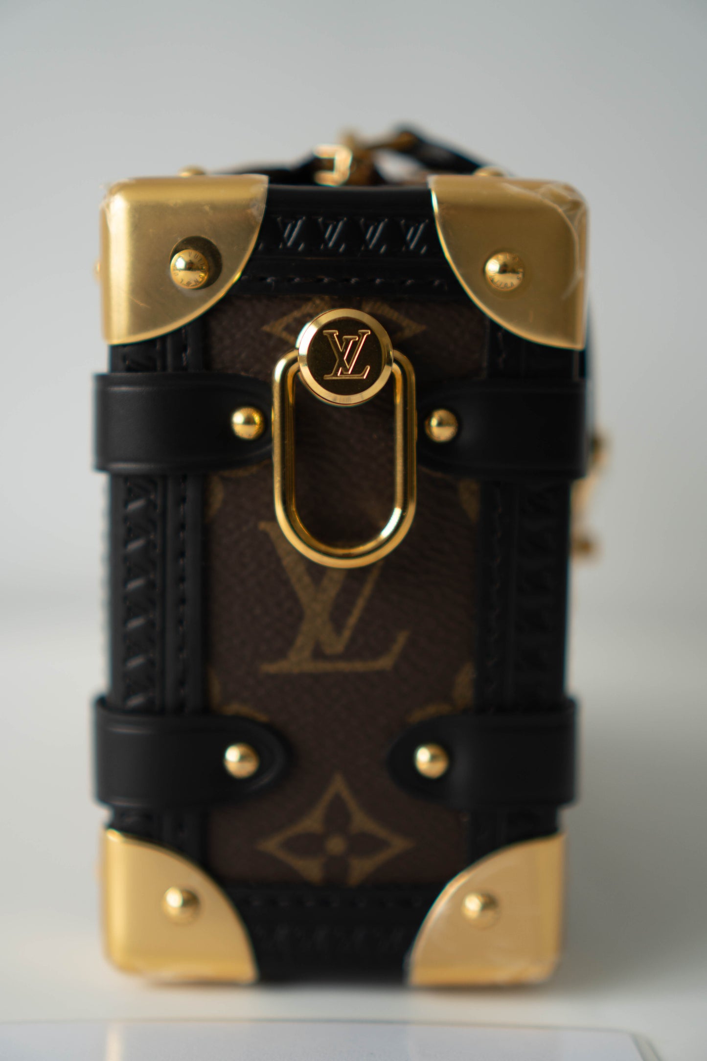 Side Trunk in PM Reverse Monogram with Gold Hardware