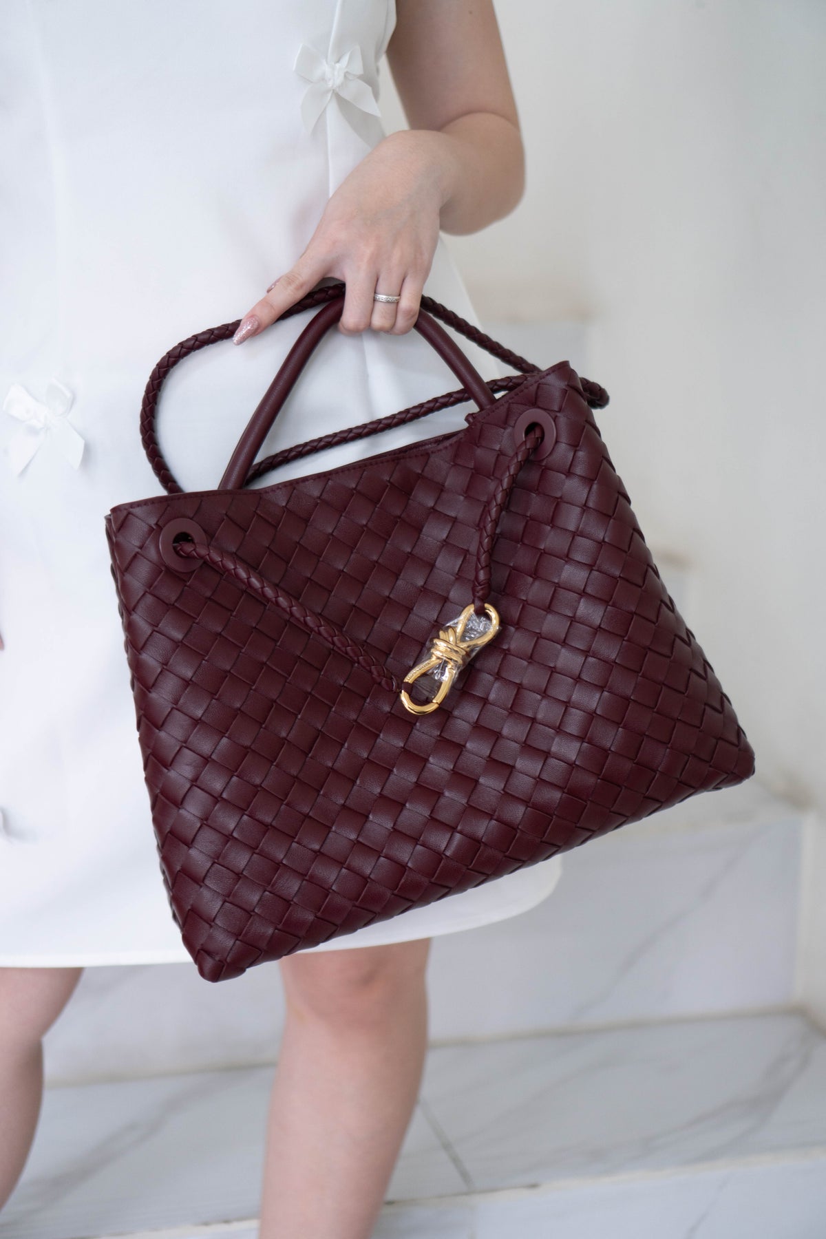 Andiamo Medium Bag – Burgundy Intrecciato Nappa Leather in Gold Hardware