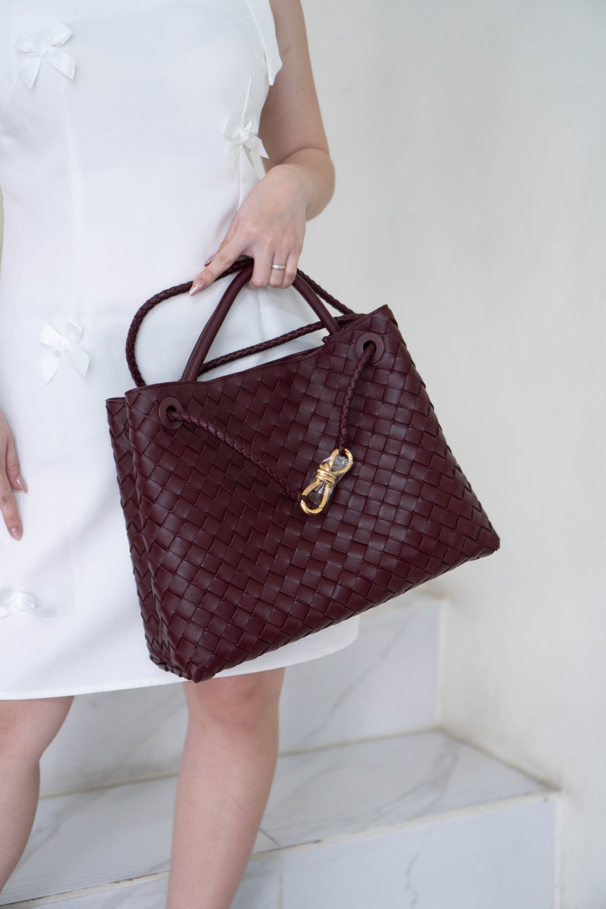Andiamo Medium Bag – Burgundy Intrecciato Nappa Leather in Gold Hardware
