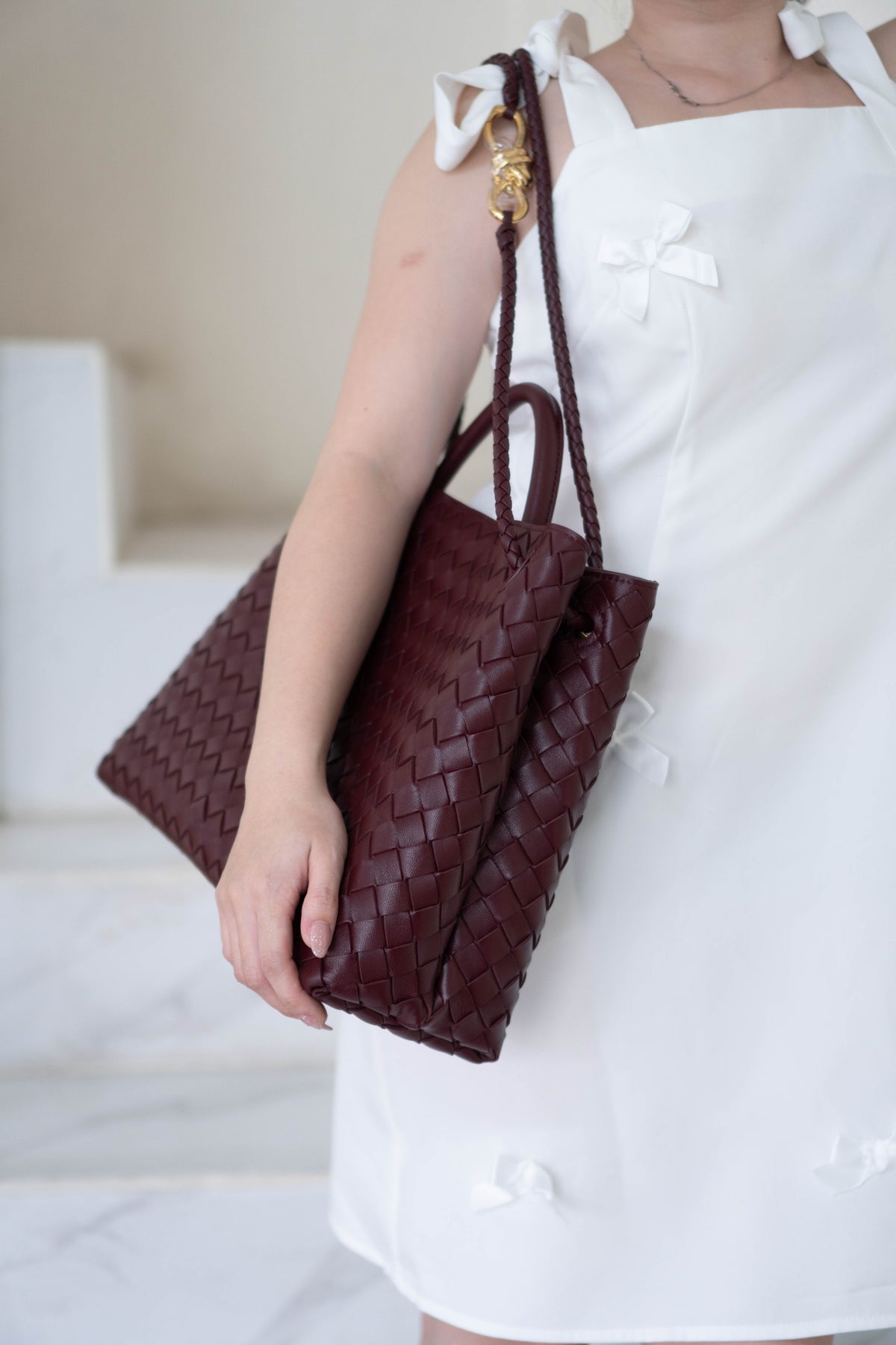 Andiamo Medium Bag – Burgundy Intrecciato Nappa Leather in Gold Hardware