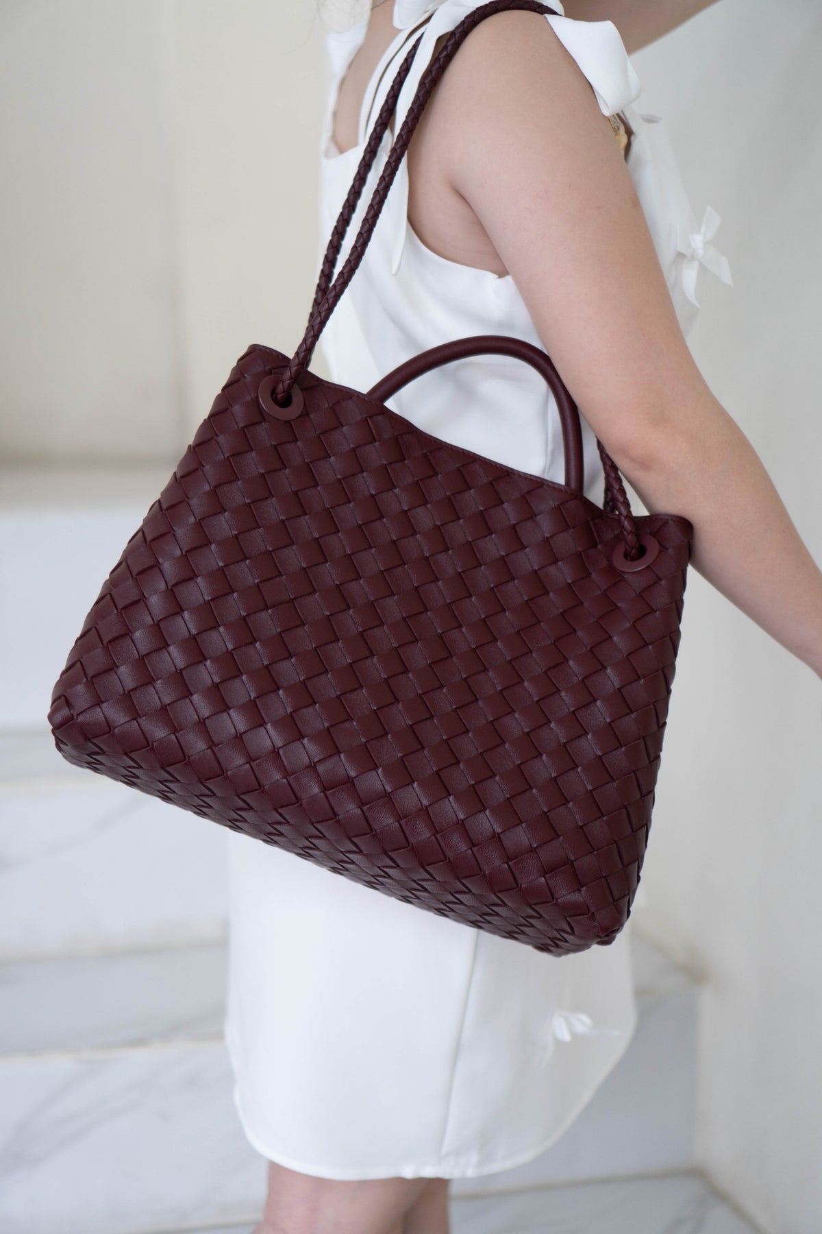 Andiamo Medium Bag – Burgundy Intrecciato Nappa Leather in Gold Hardware