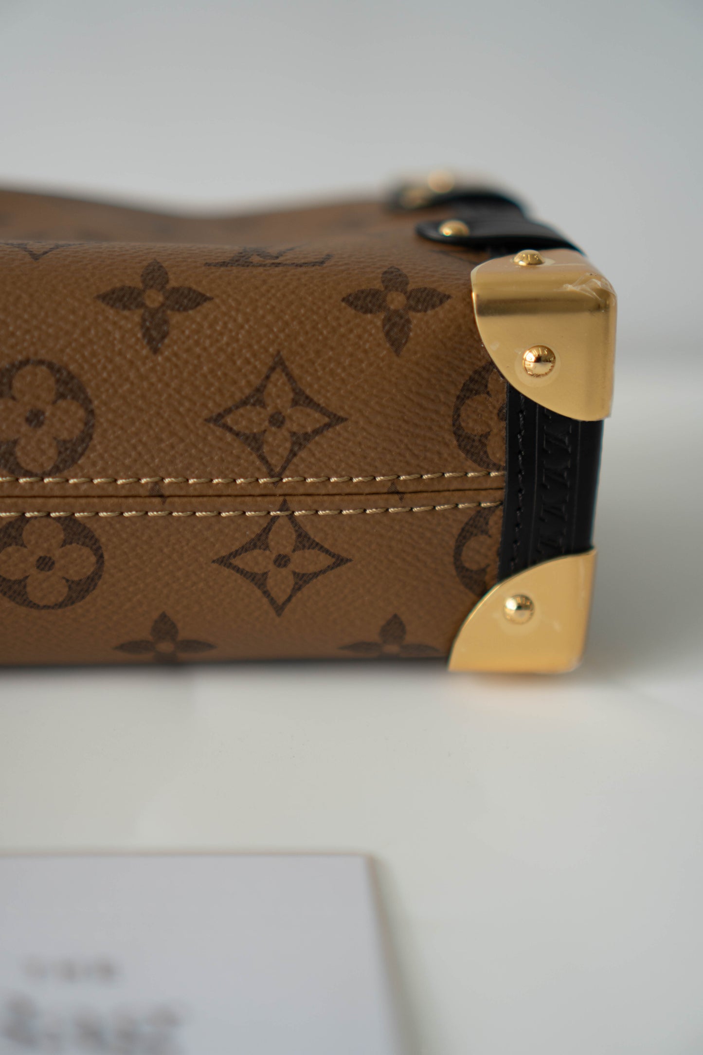 Side Trunk in PM Reverse Monogram with Gold Hardware