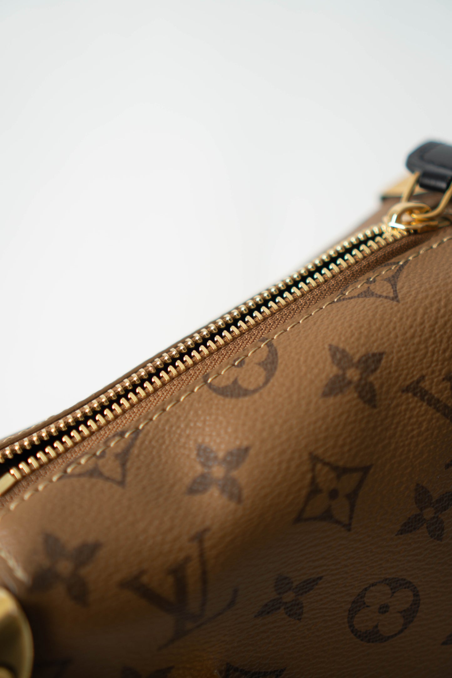 Side Trunk in PM Reverse Monogram with Gold Hardware