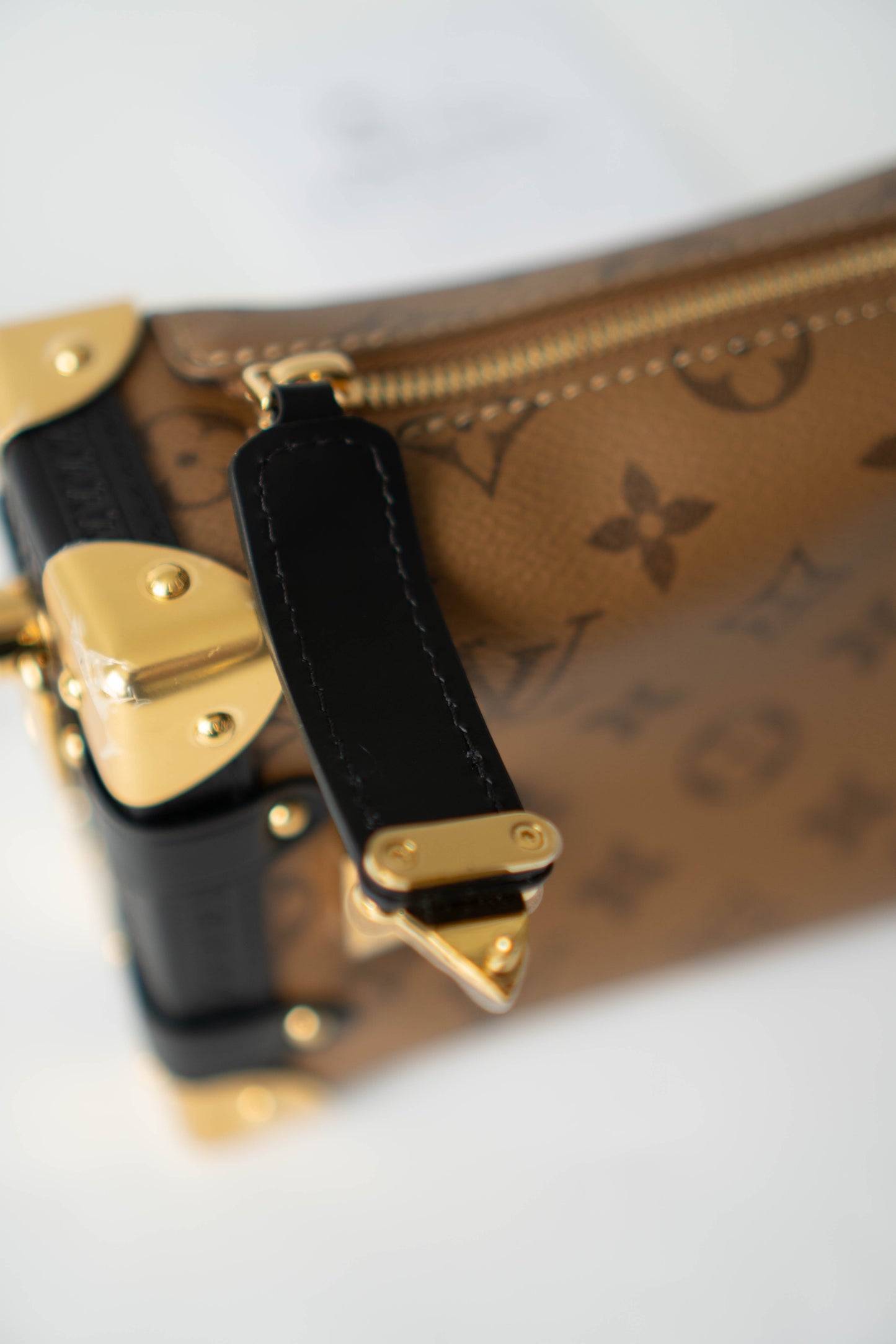 Side Trunk in PM Reverse Monogram with Gold Hardware