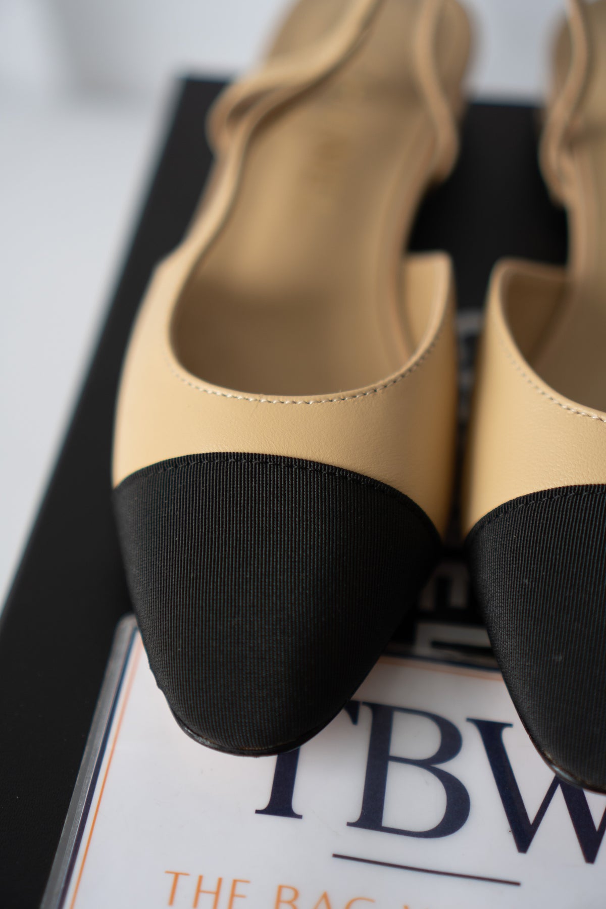 Classic Two-Tone Slingback Flats – Beige Leather with Black Grosgrain Toe