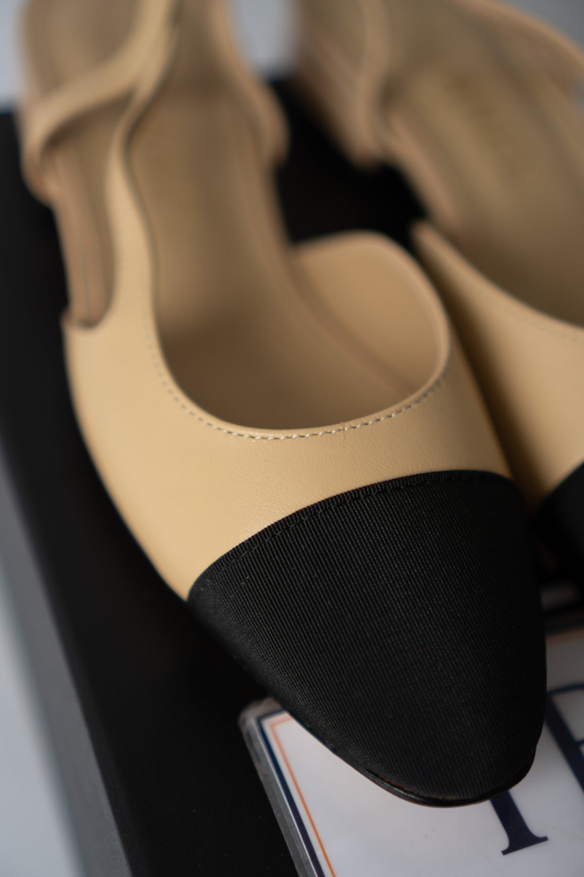 Classic Two-Tone Slingback Flats – Beige Leather with Black Grosgrain Toe