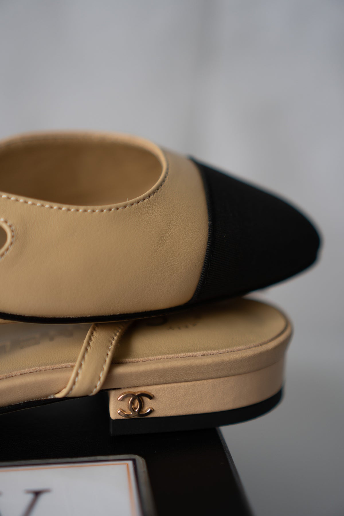 Classic Two-Tone Slingback Flats – Beige Leather with Black Grosgrain Toe