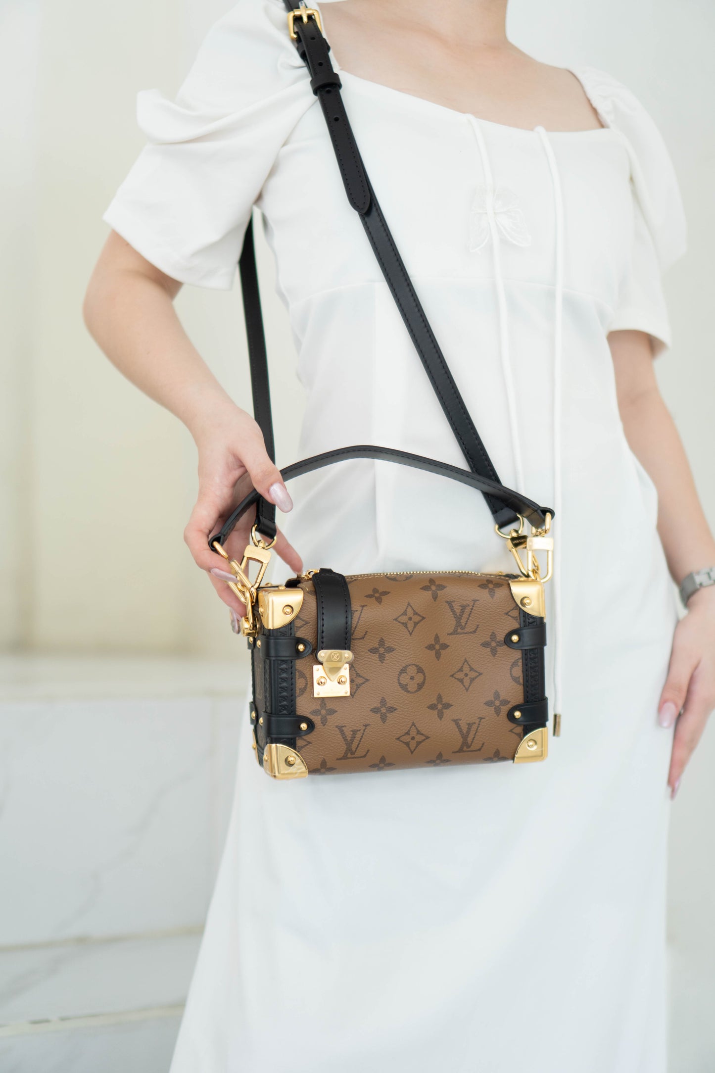 Side Trunk in PM Reverse Monogram with Gold Hardware