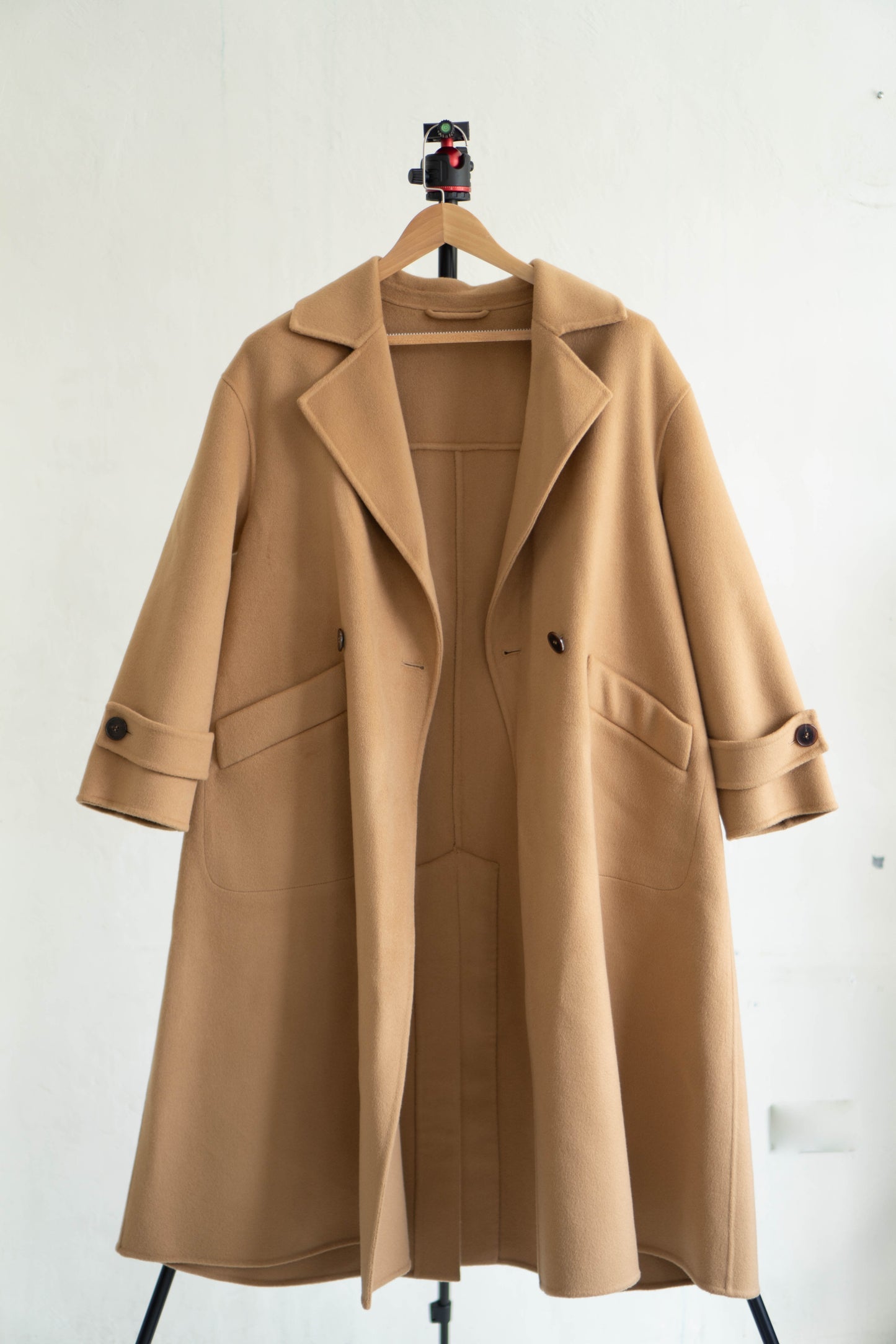 long camel-colored double-faced wool coat
