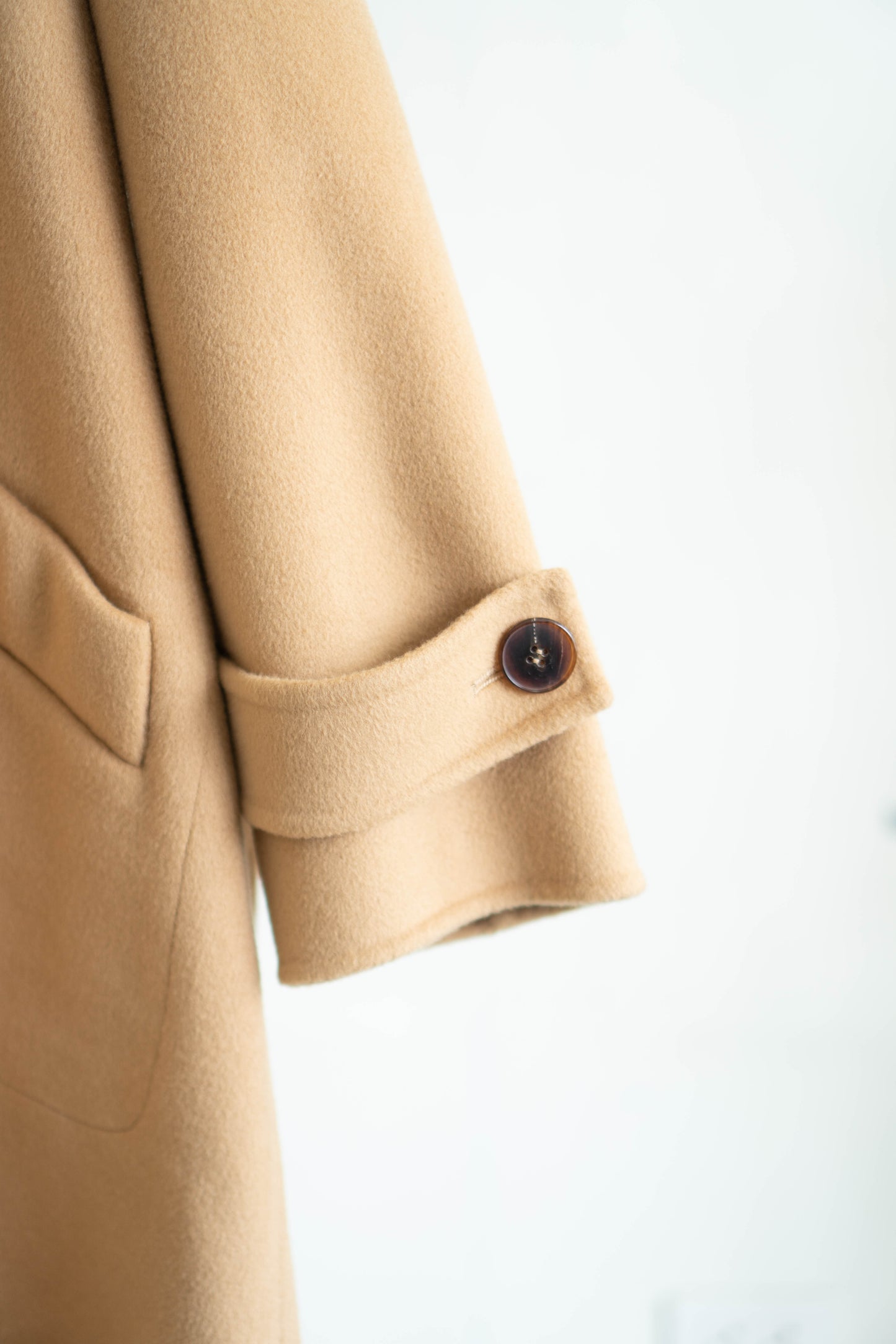 long camel-colored double-faced wool coat