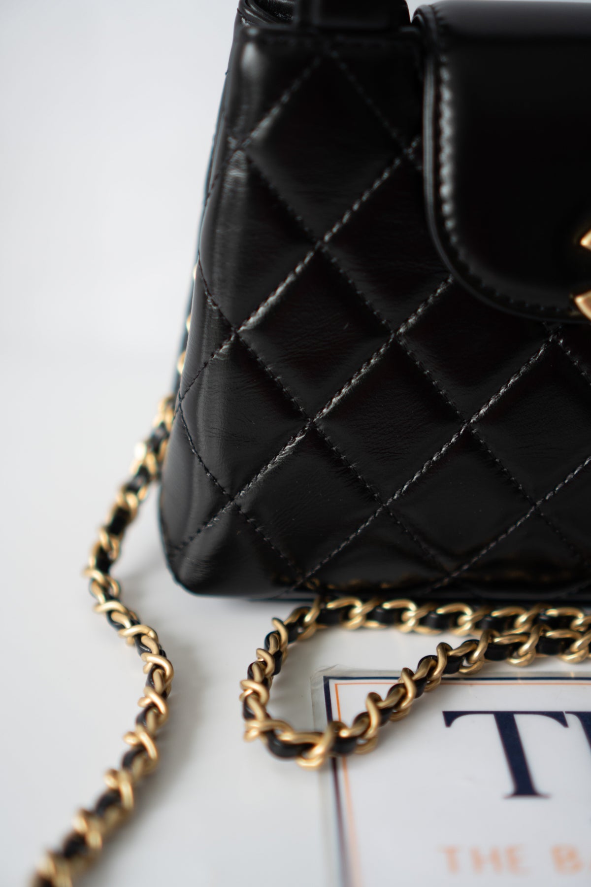 CC Kelly Quilted Top Handle Bag – Black Lambskin with Gold Hardware