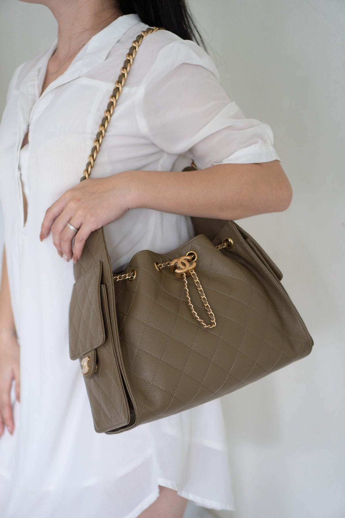 C25 Drawstring Bucket Bag – Small Khaki Green Caviar with Gold Hardware