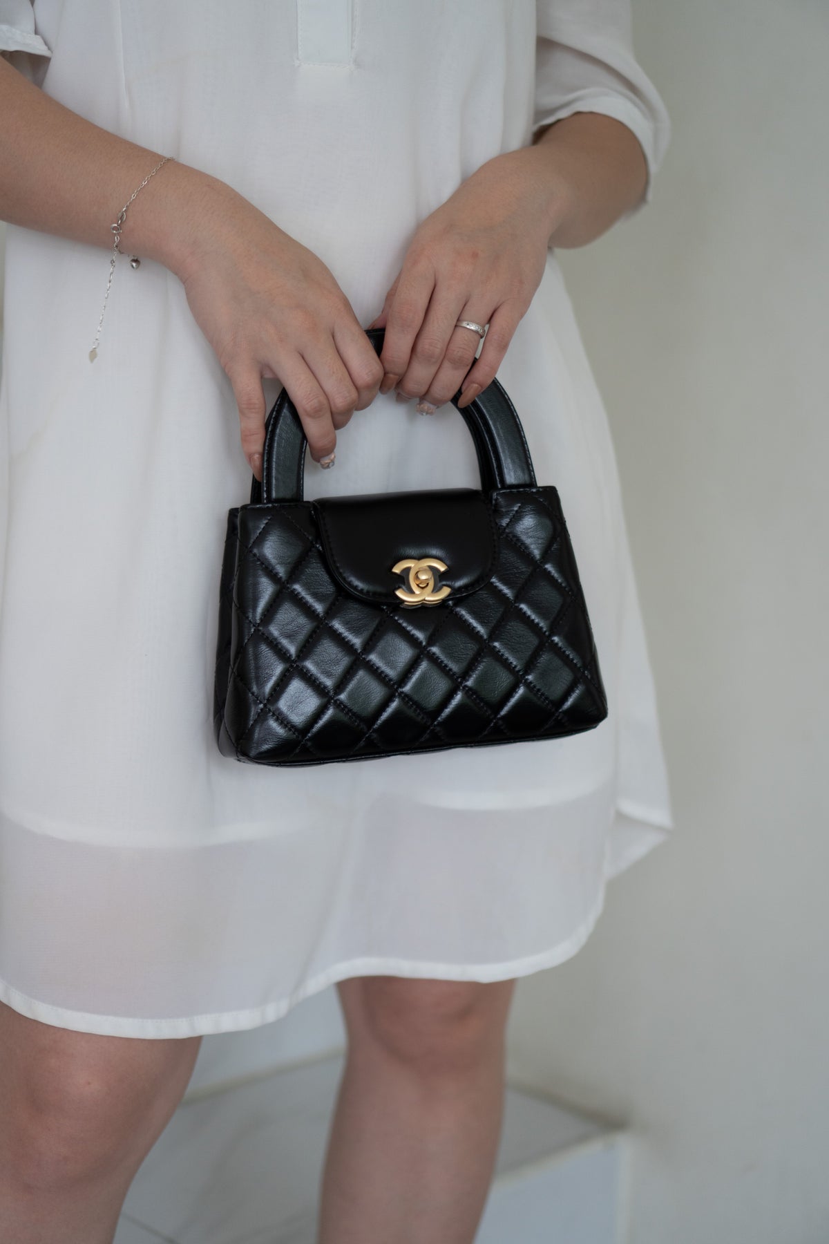 CC Kelly Quilted Top Handle Bag – Black Lambskin with Gold Hardware