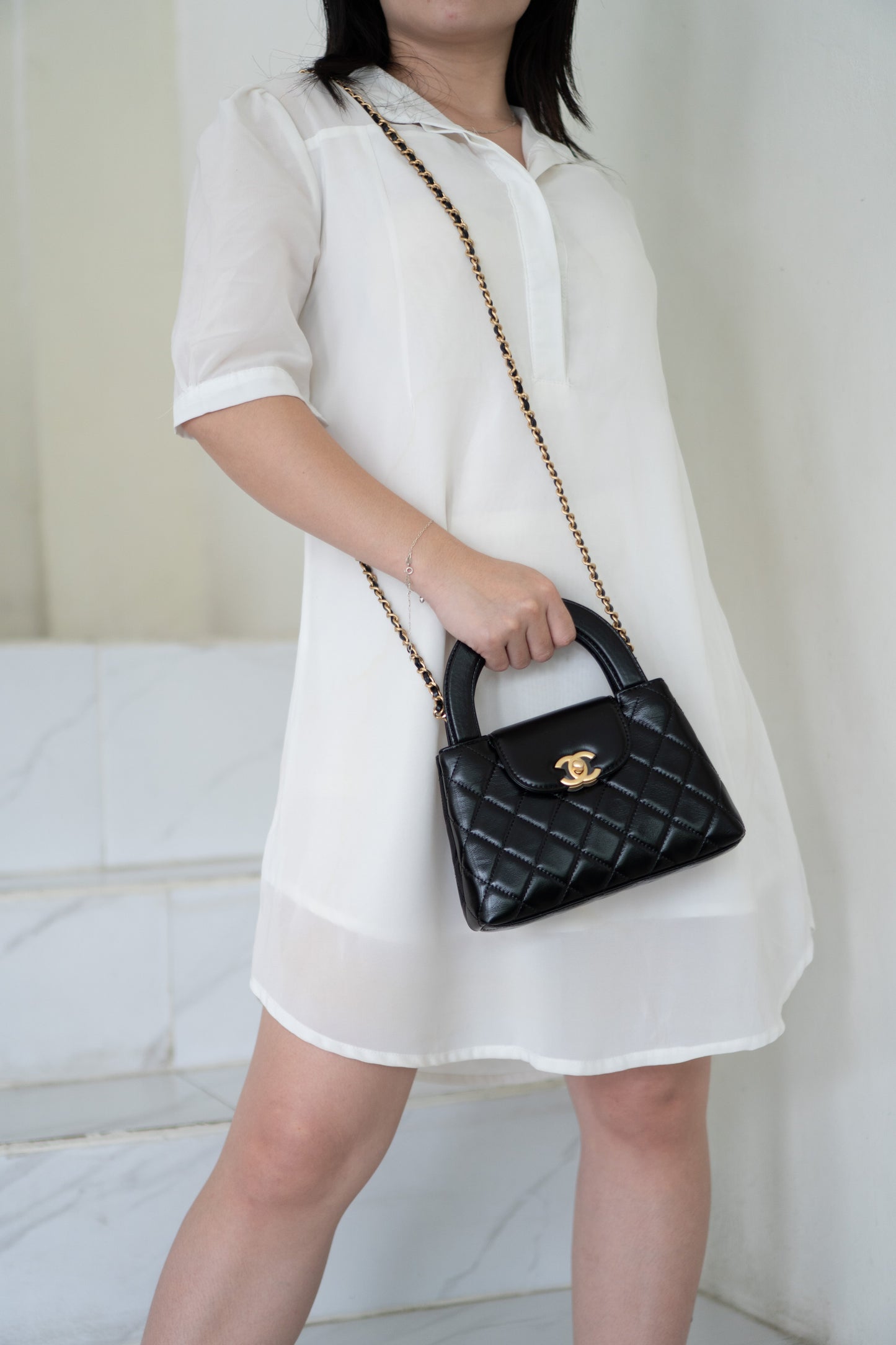 CC Kelly Quilted Top Handle Bag – Black Lambskin with Gold Hardware