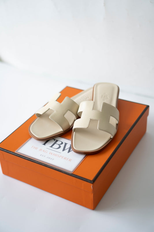 Oran Sandals in Beige Nomade Swift Leather