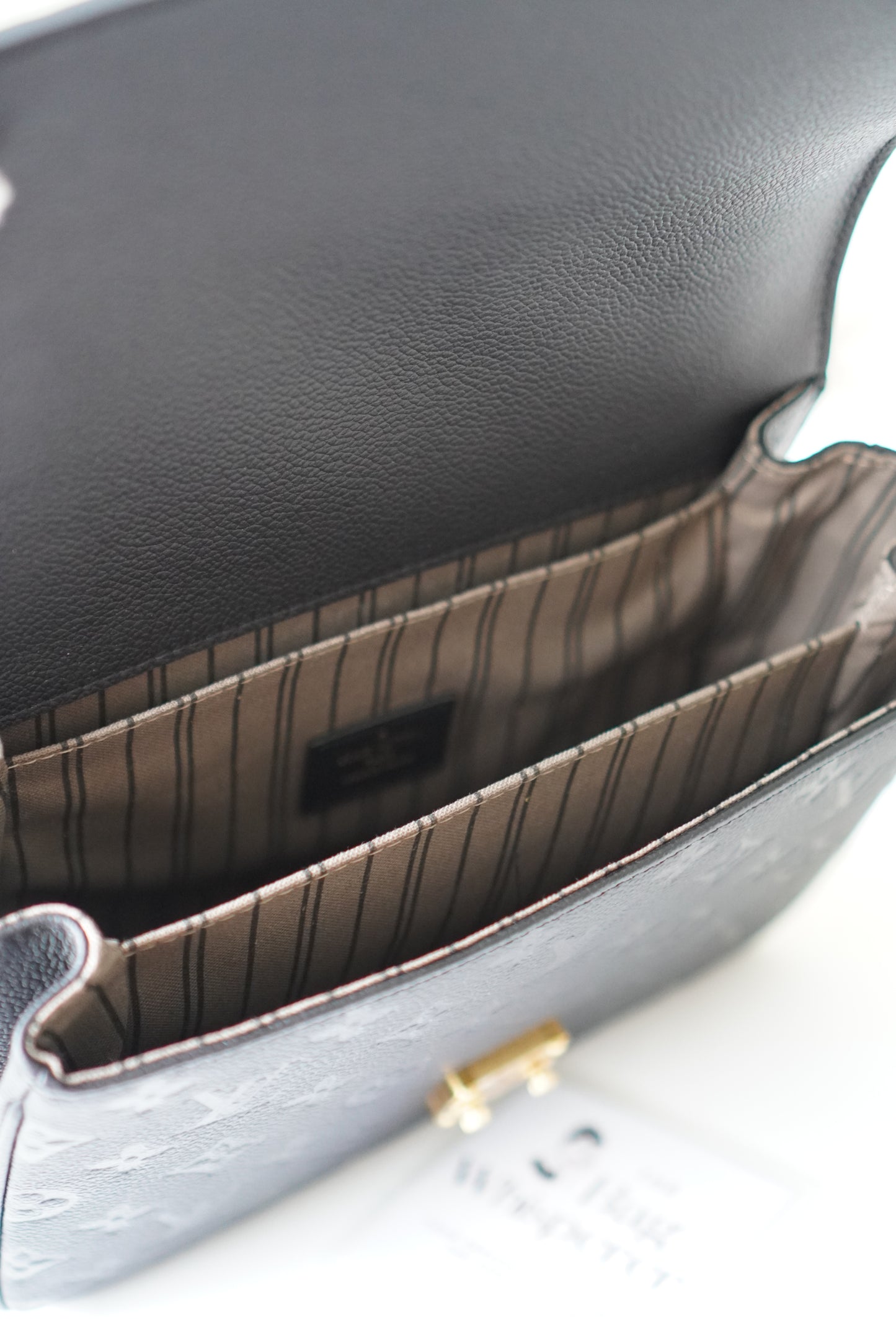Pochette Metis in Black Empreinte leather