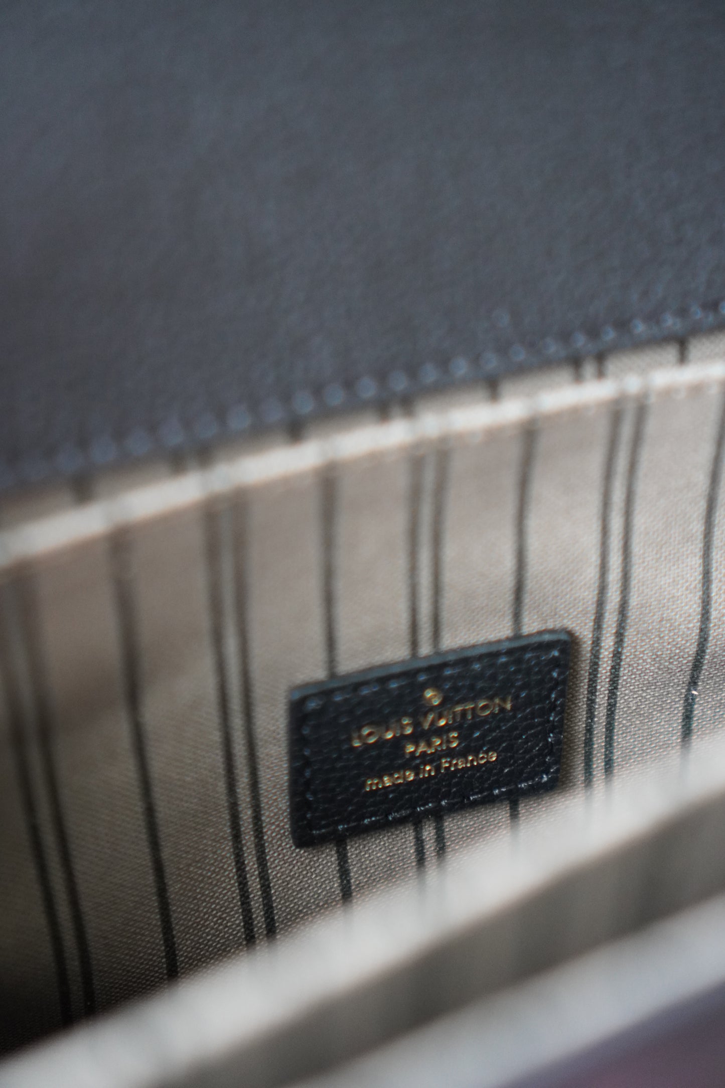 Pochette Metis in Black Empreinte leather