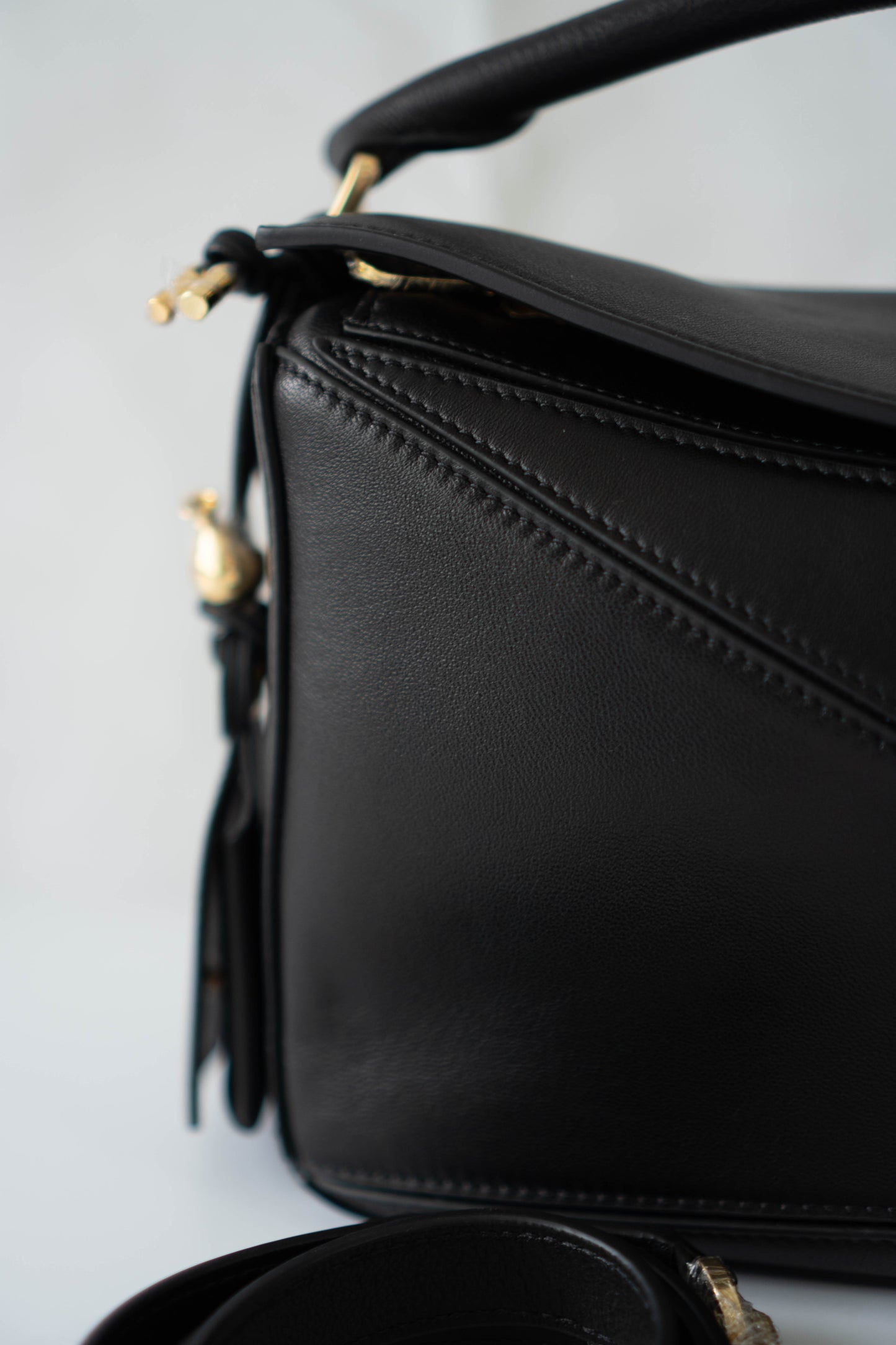 Puzzle Small Bag – Black Satin Calfskin Leather with Gold Hardware