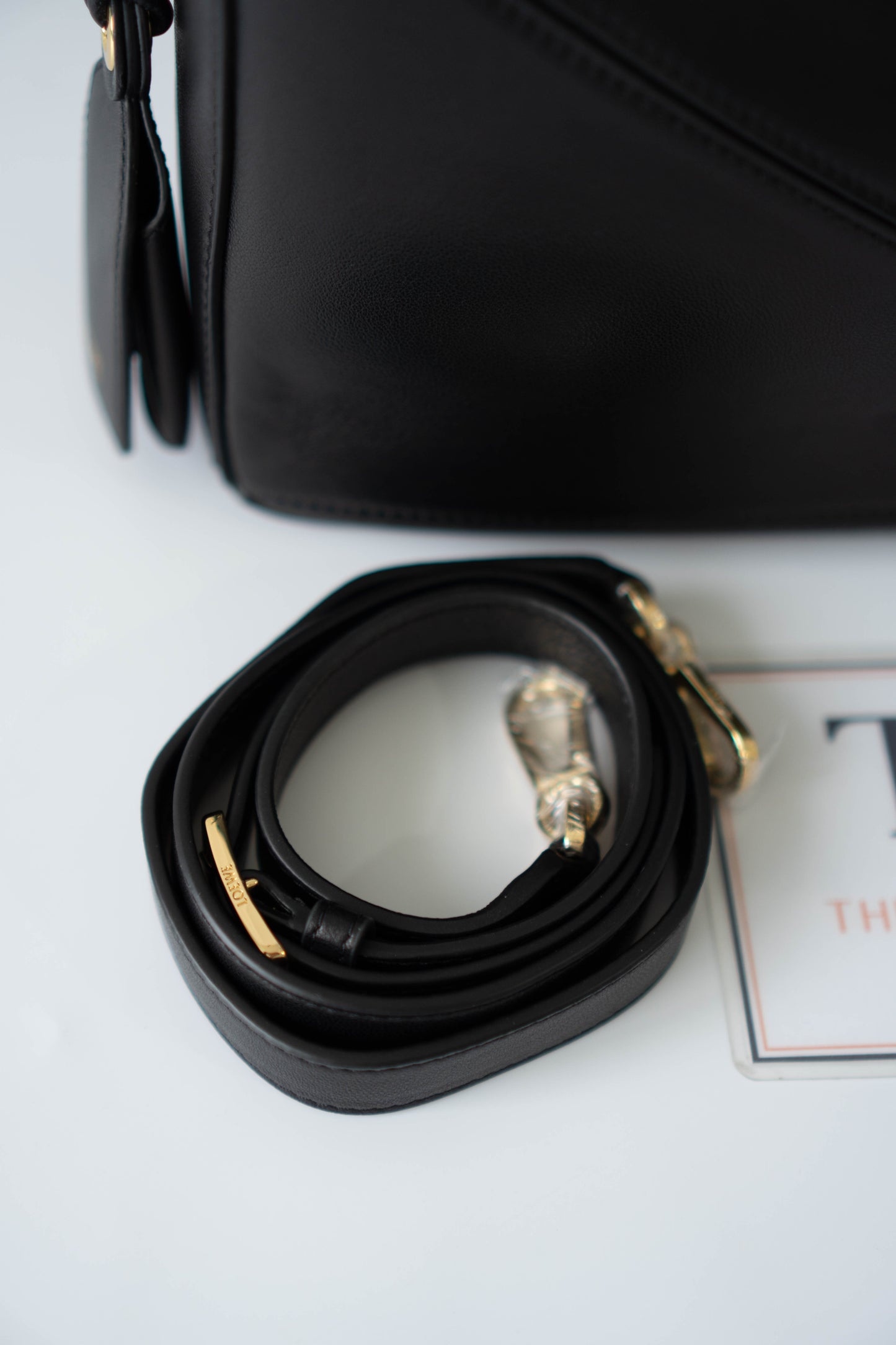 Puzzle Small Bag – Black Satin Calfskin Leather with Gold Hardware