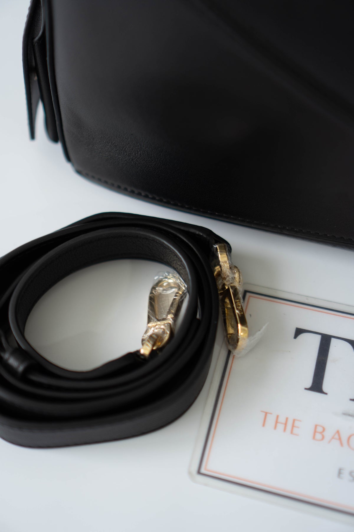 Puzzle Small Bag – Black Satin Calfskin Leather with Gold Hardware