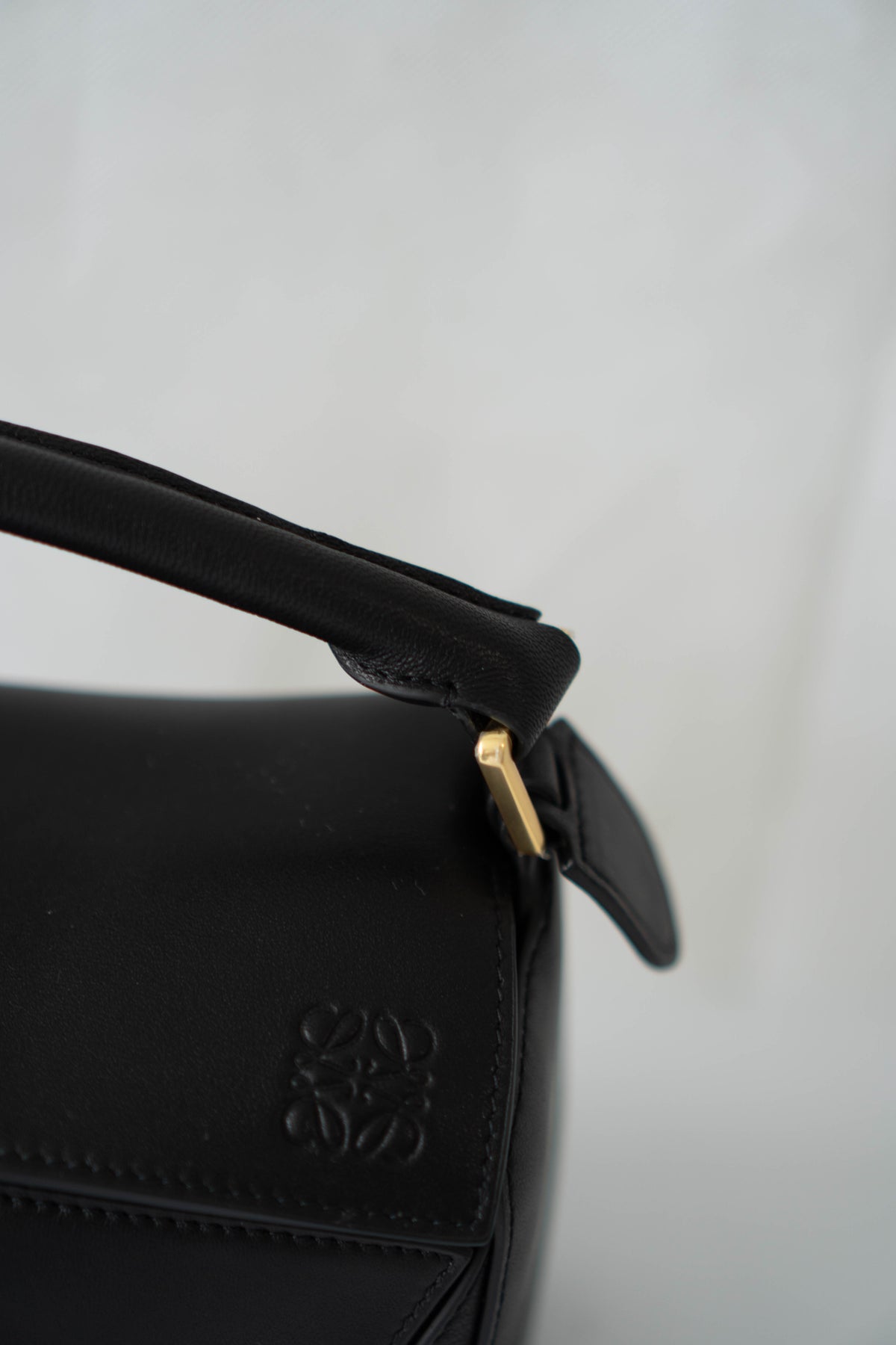 Puzzle Small Bag – Black Satin Calfskin Leather with Gold Hardware