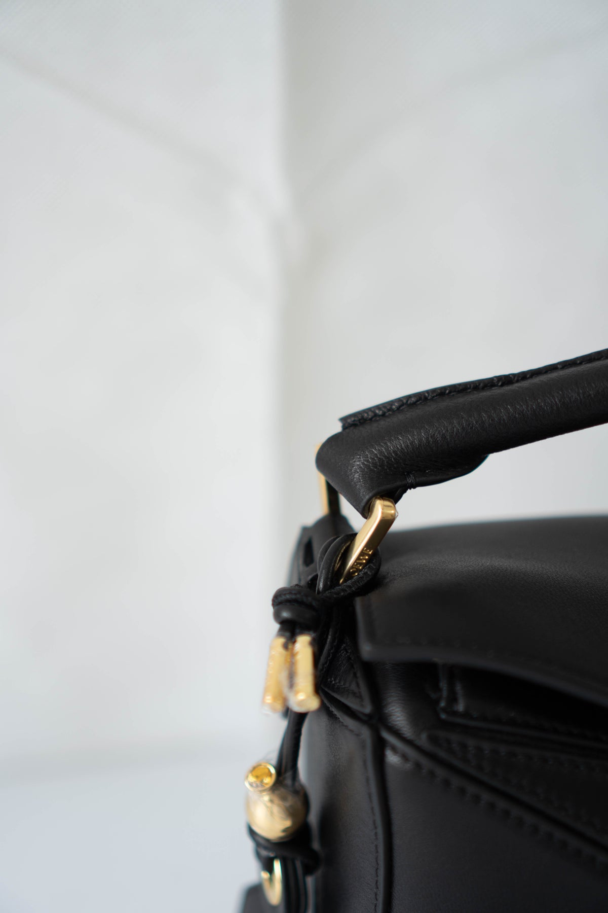 Puzzle Small Bag – Black Satin Calfskin Leather with Gold Hardware