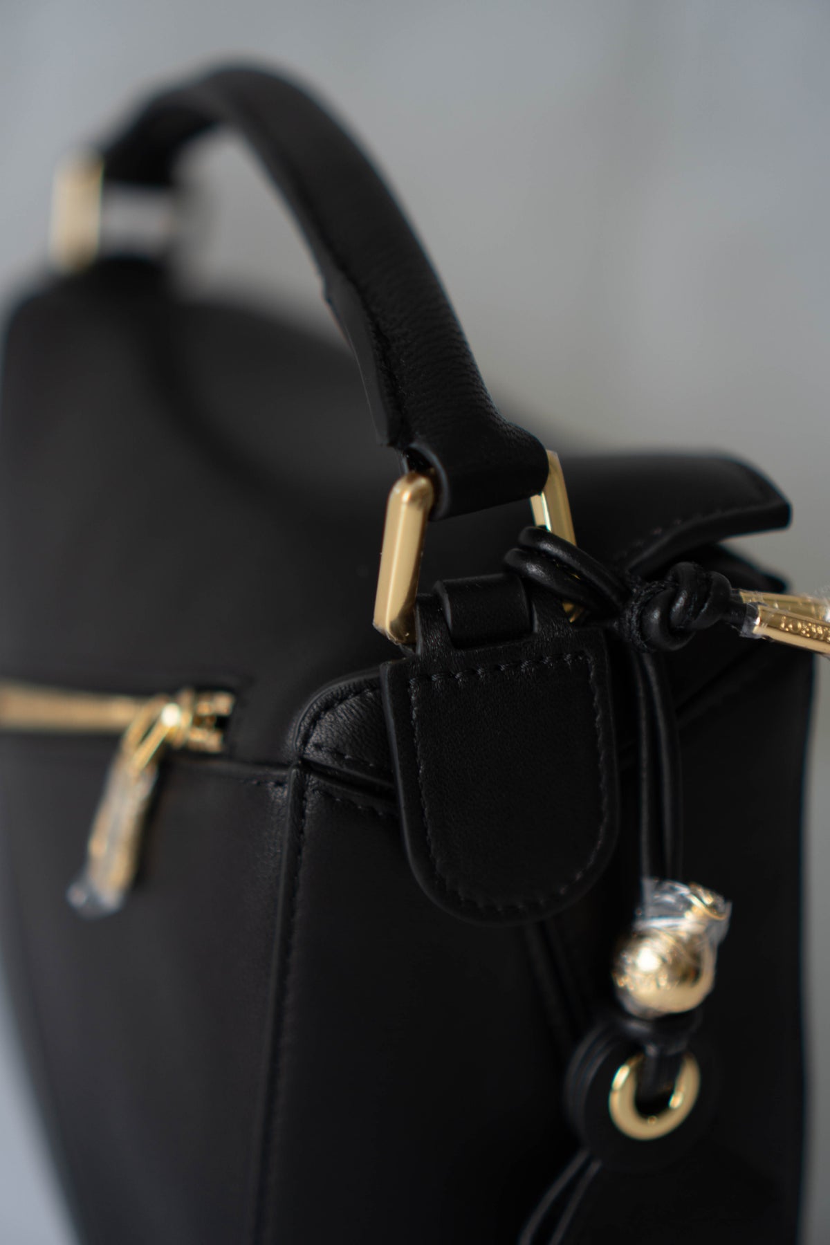 Puzzle Small Bag – Black Satin Calfskin Leather with Gold Hardware