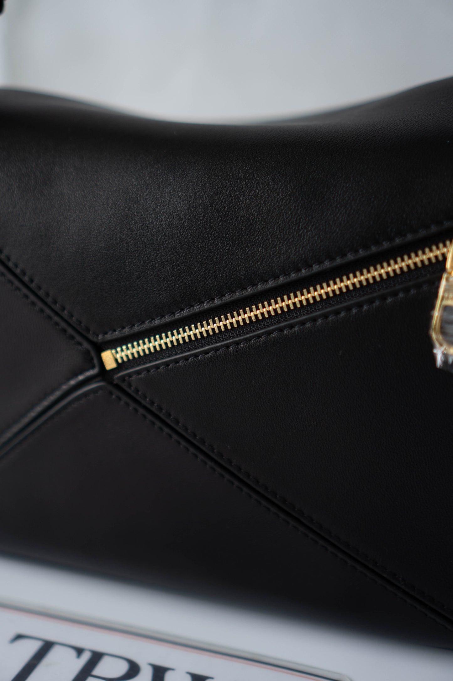 Puzzle Small Bag – Black Satin Calfskin Leather with Gold Hardware