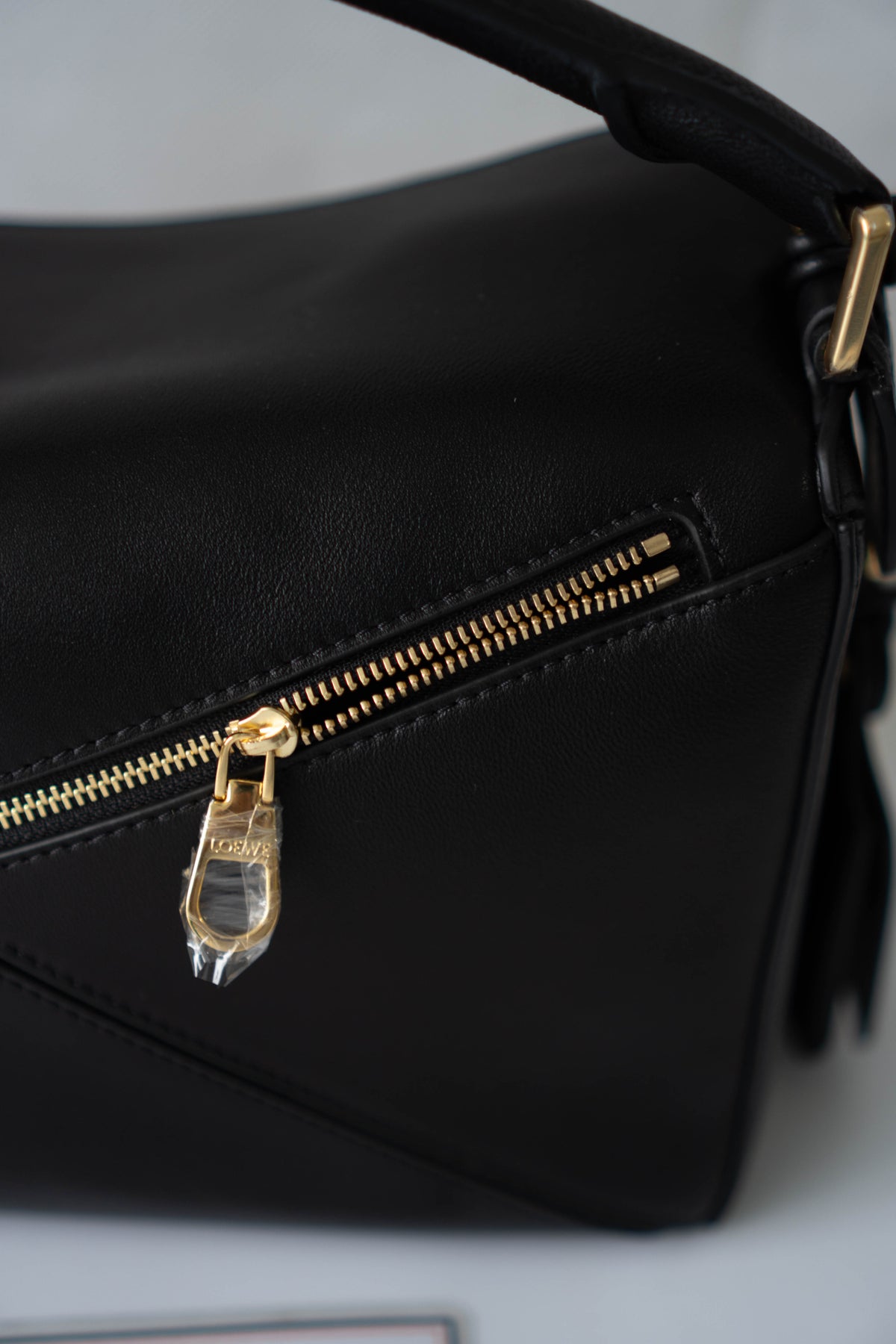 Puzzle Small Bag – Black Satin Calfskin Leather with Gold Hardware