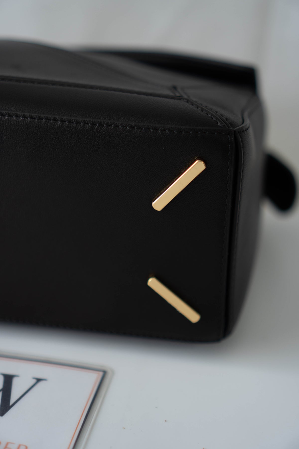 Puzzle Small Bag – Black Satin Calfskin Leather with Gold Hardware